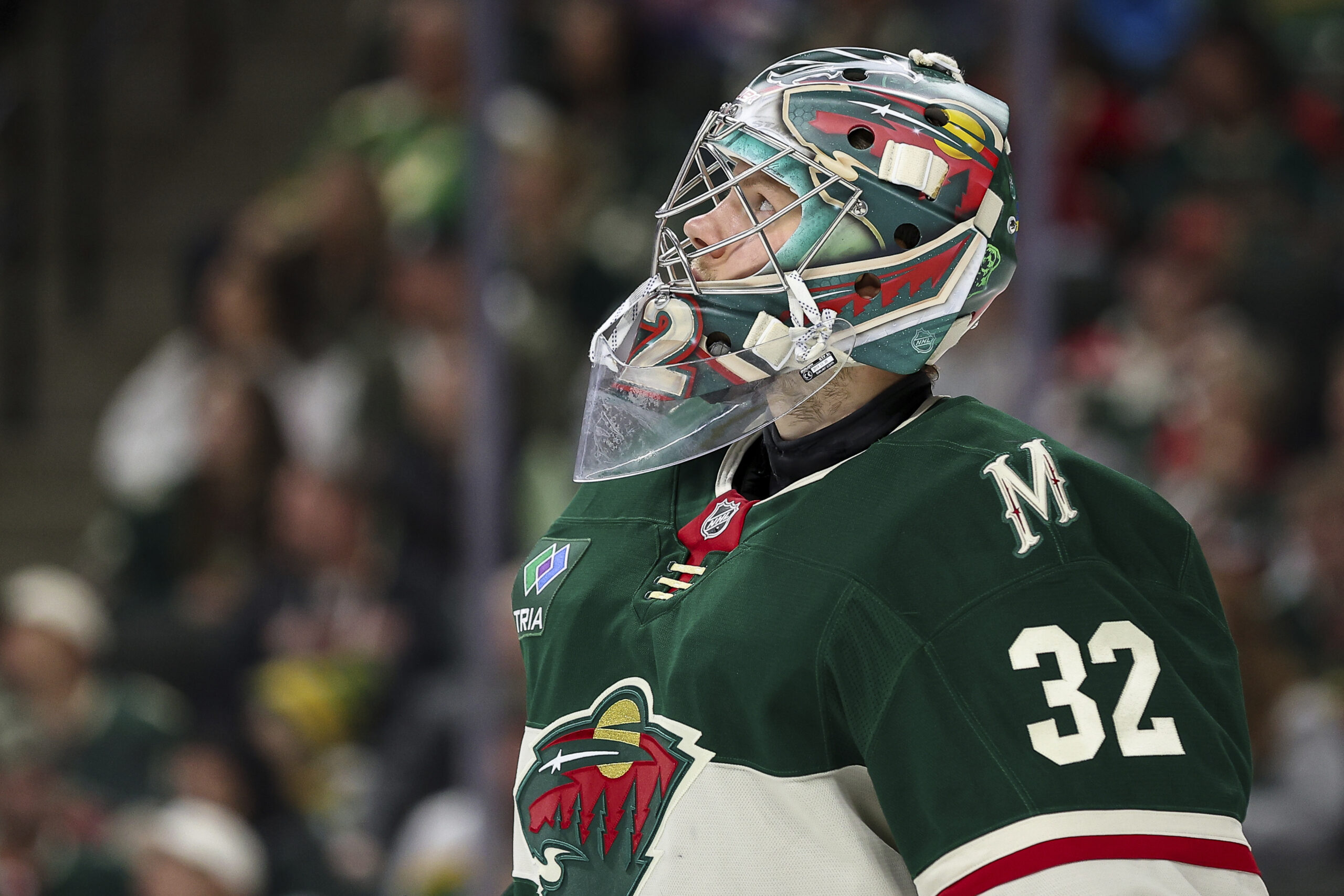 Minnesota Wild goaltender Filip Gustavsson looks up at the video...