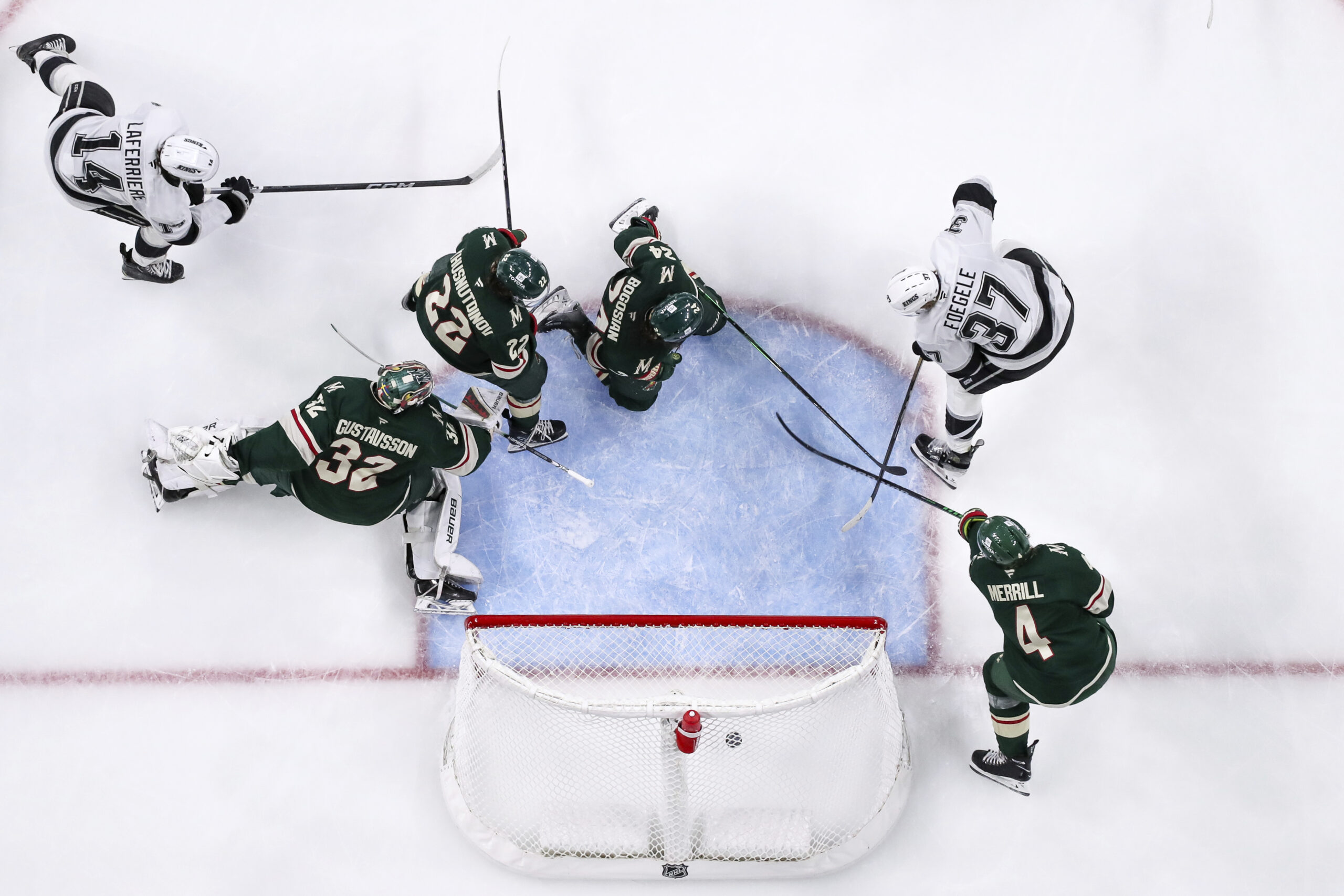 Kings left wing Warren Foegele (37) scores a goal past...