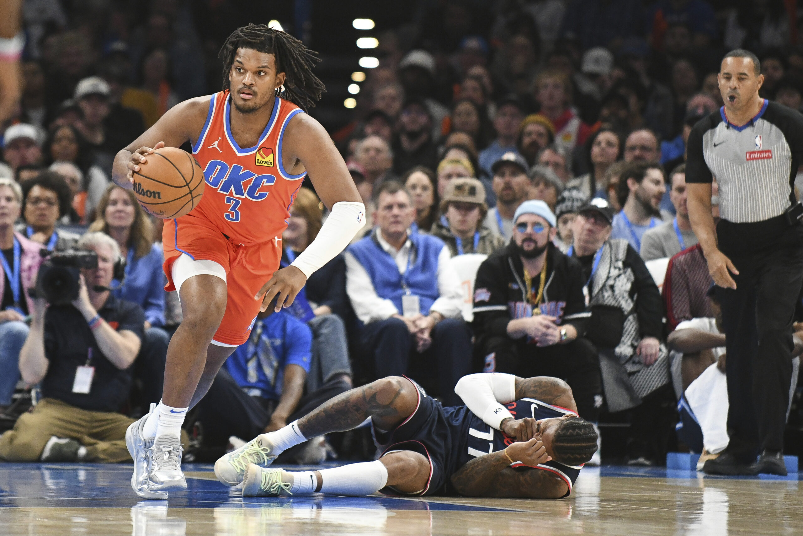 Oklahoma City Thunder forward Dillon Jones (3) pushes past Clippers...