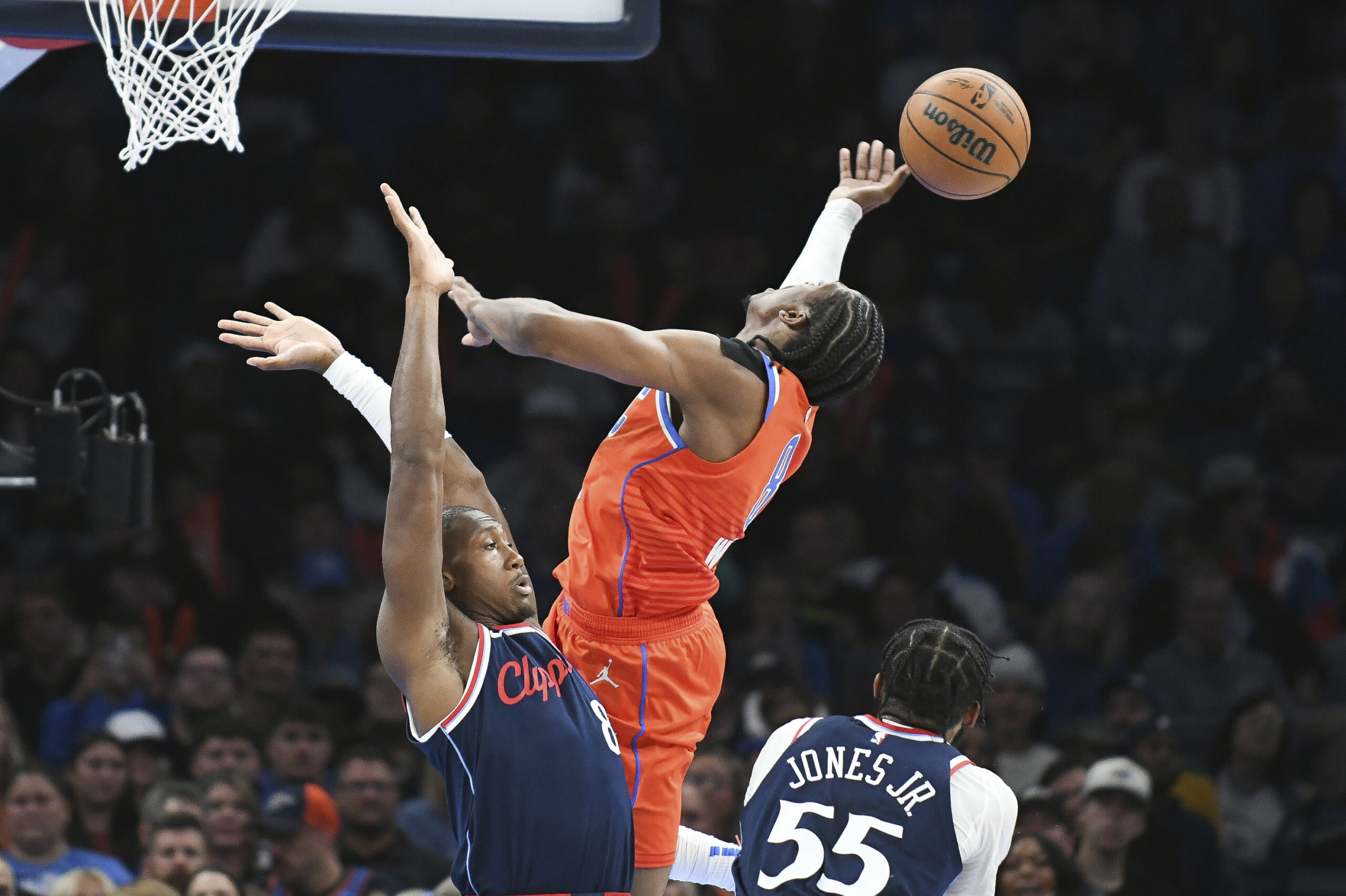 Oklahoma City Thunder forward Jalen Williams, top right, loses the...