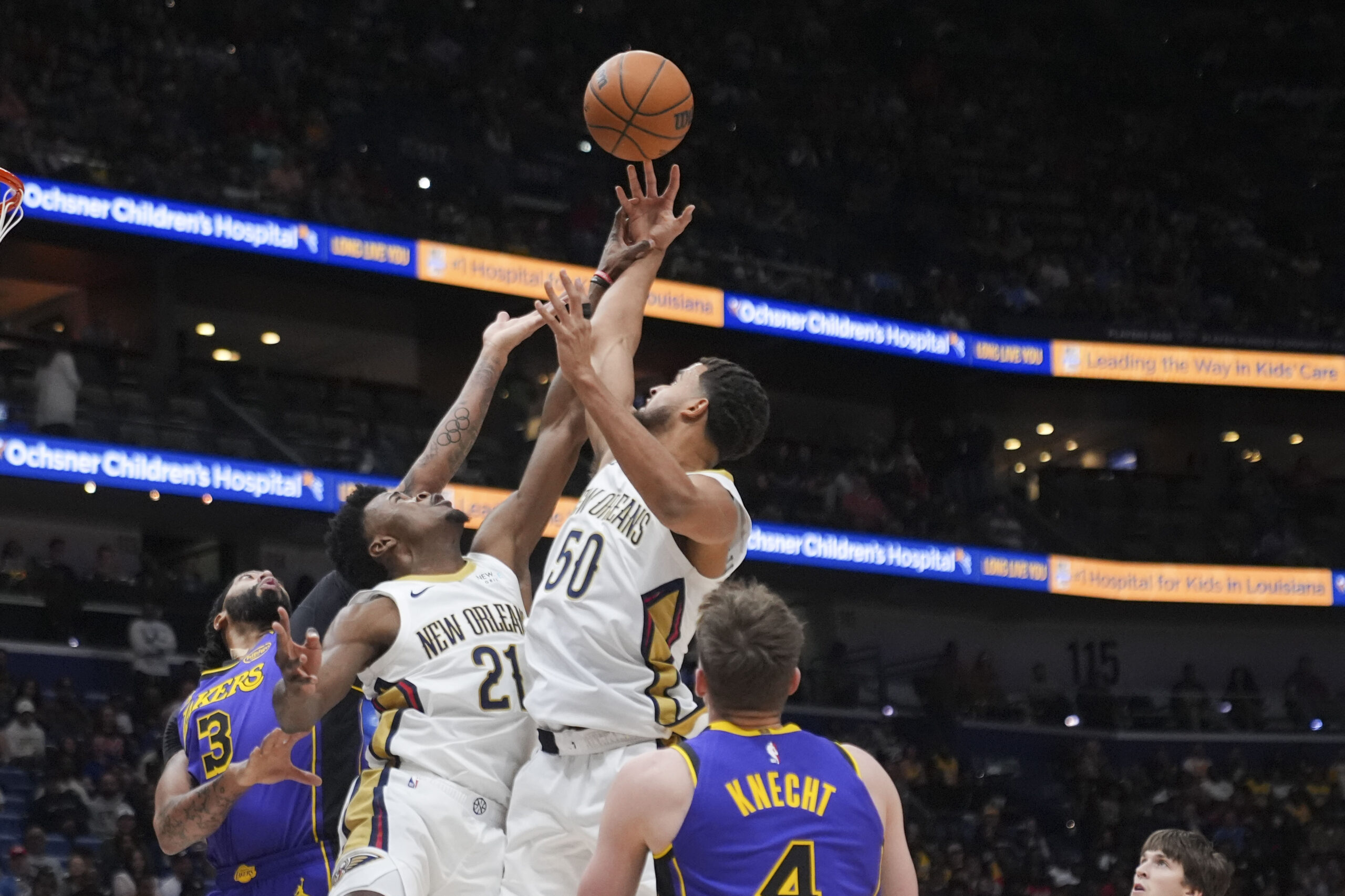 New Orleans Pelicans center Yves Missi (21) and forward Jeremiah...