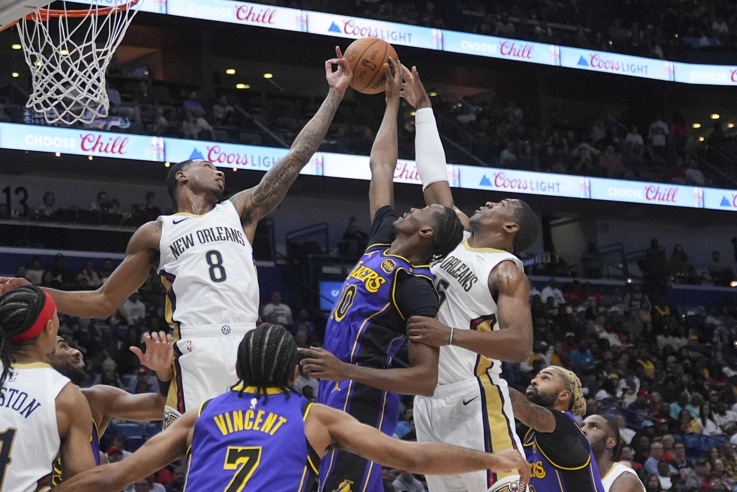 New Orleans Pelicans forward Jamal Cain (8) and center Trey...