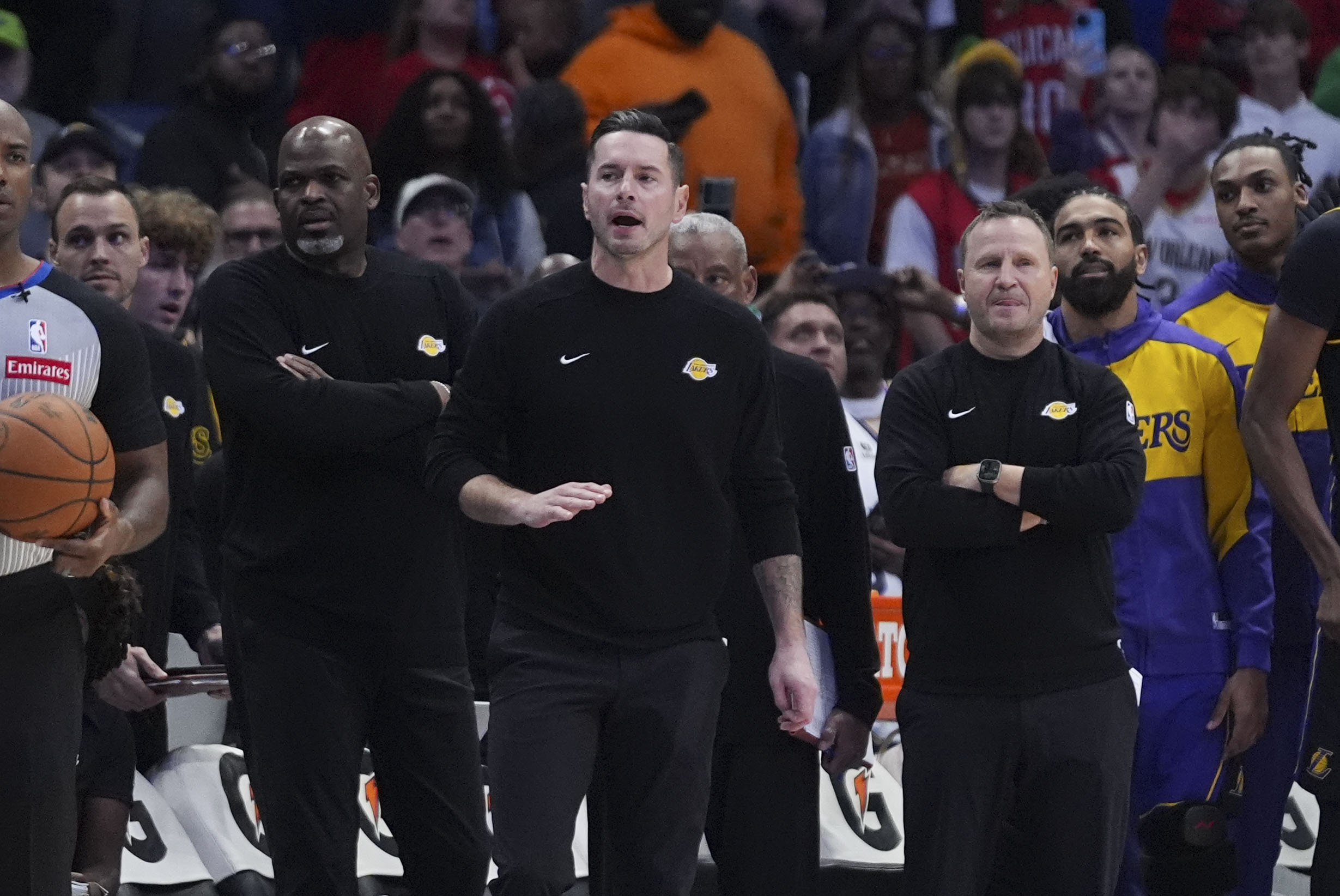 Lakers head coach JJ Redick calls out from the bench...