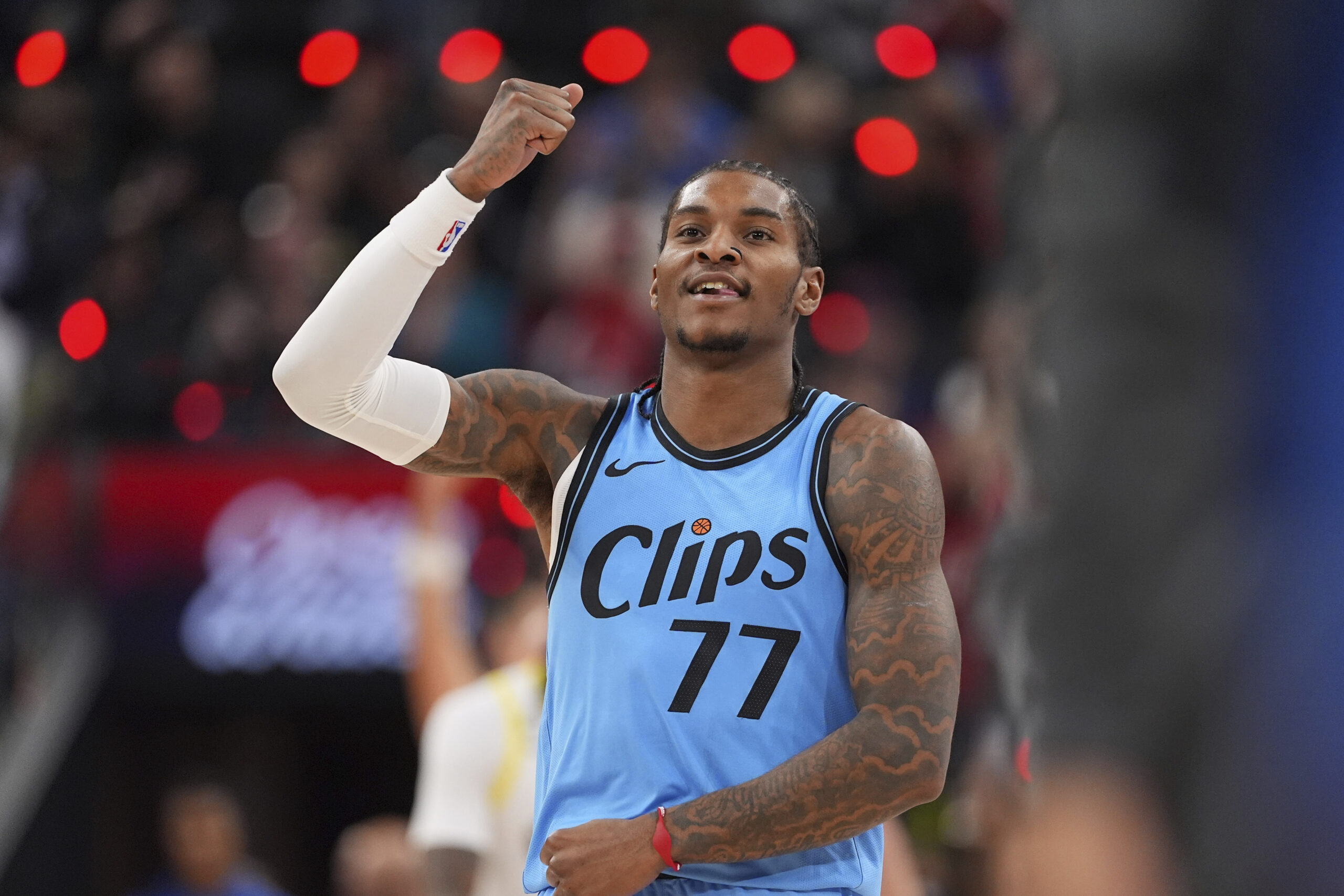 Clippers guard Kevin Porter Jr. celebrates after scoring during the...