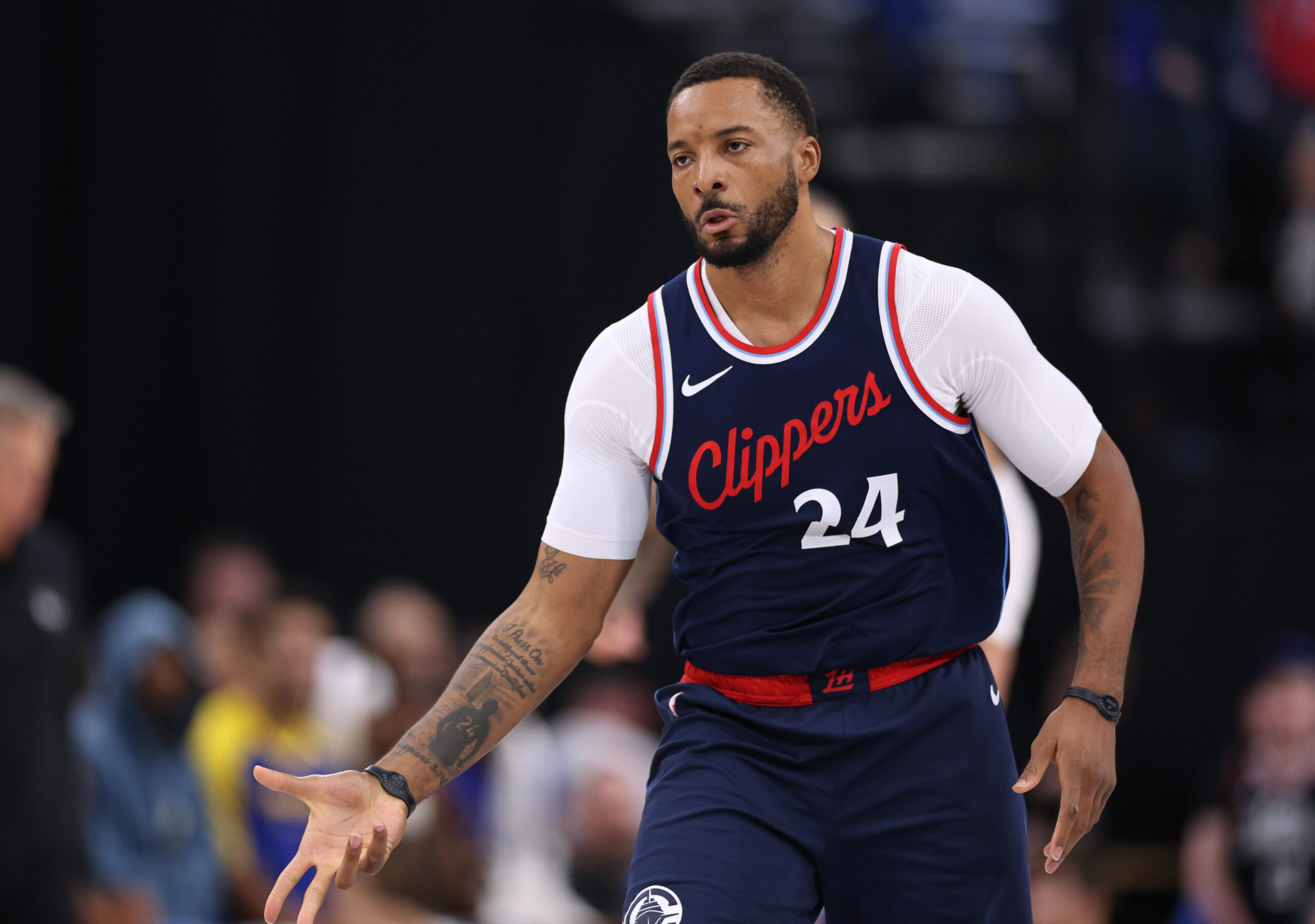 Clippers guard Norman Powell gestures after making a 3-point shot...