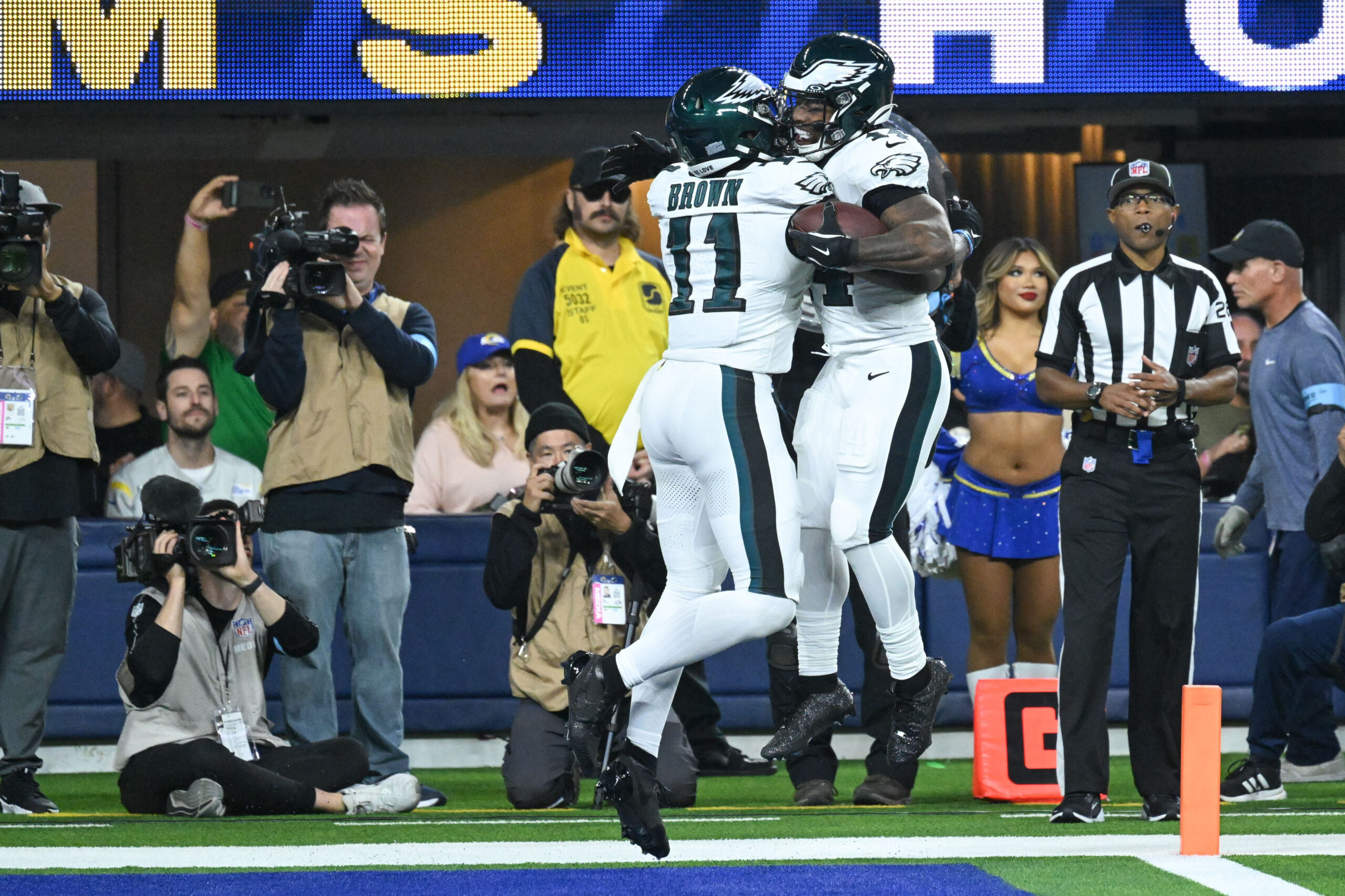 Eagles Kenneth Gainwell, #14, and A.J. Brown, #11, celebrate Gainwwell’s...