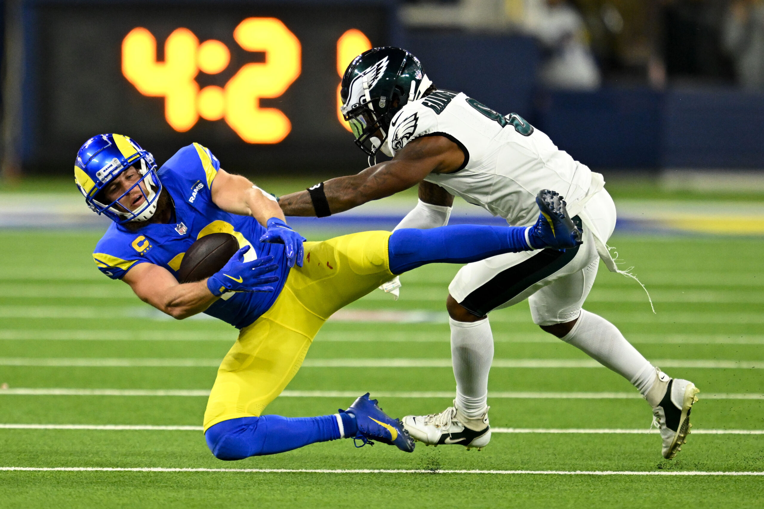 Rams Cooper Kupp, #10, pulls in a pass for a...