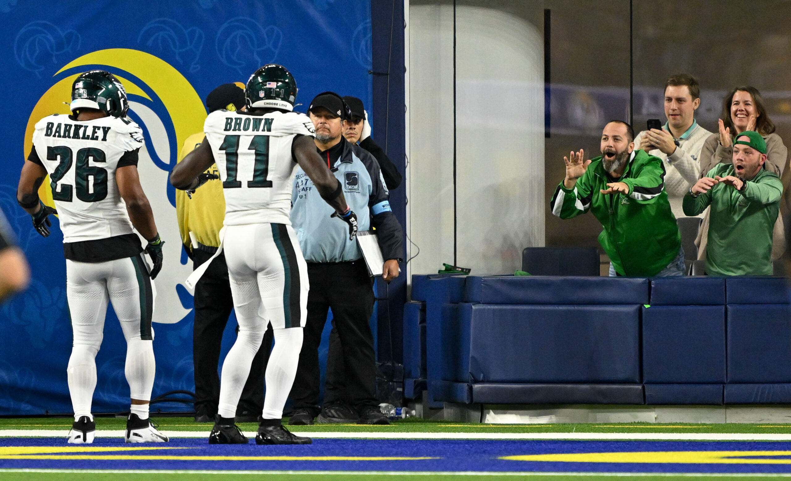 Eagles Saquon Barkley, #26, and A.J. Brown, #11, dance with...