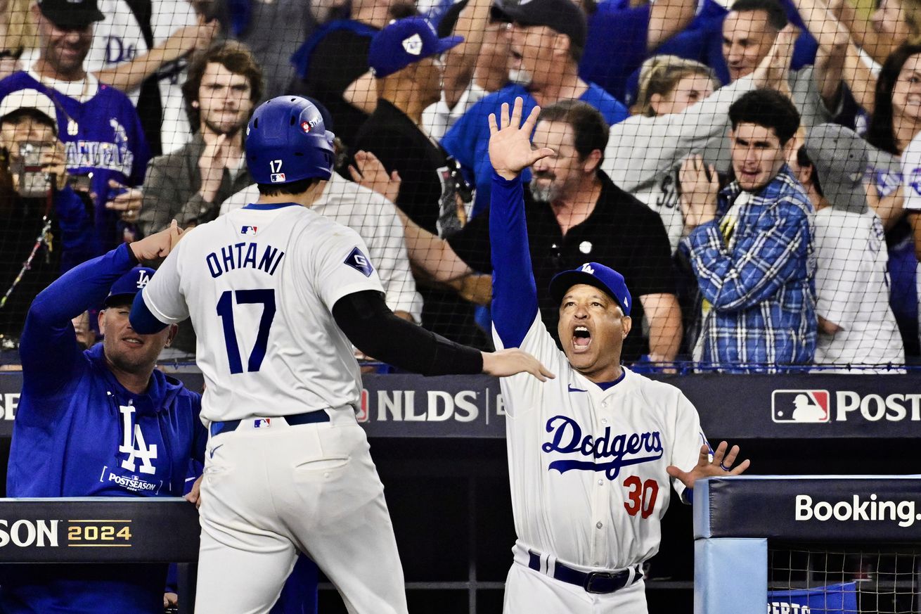 Los Angeles Dodgers defeated the San Diego Padres 7-5 to win game 1 of the NLDS.