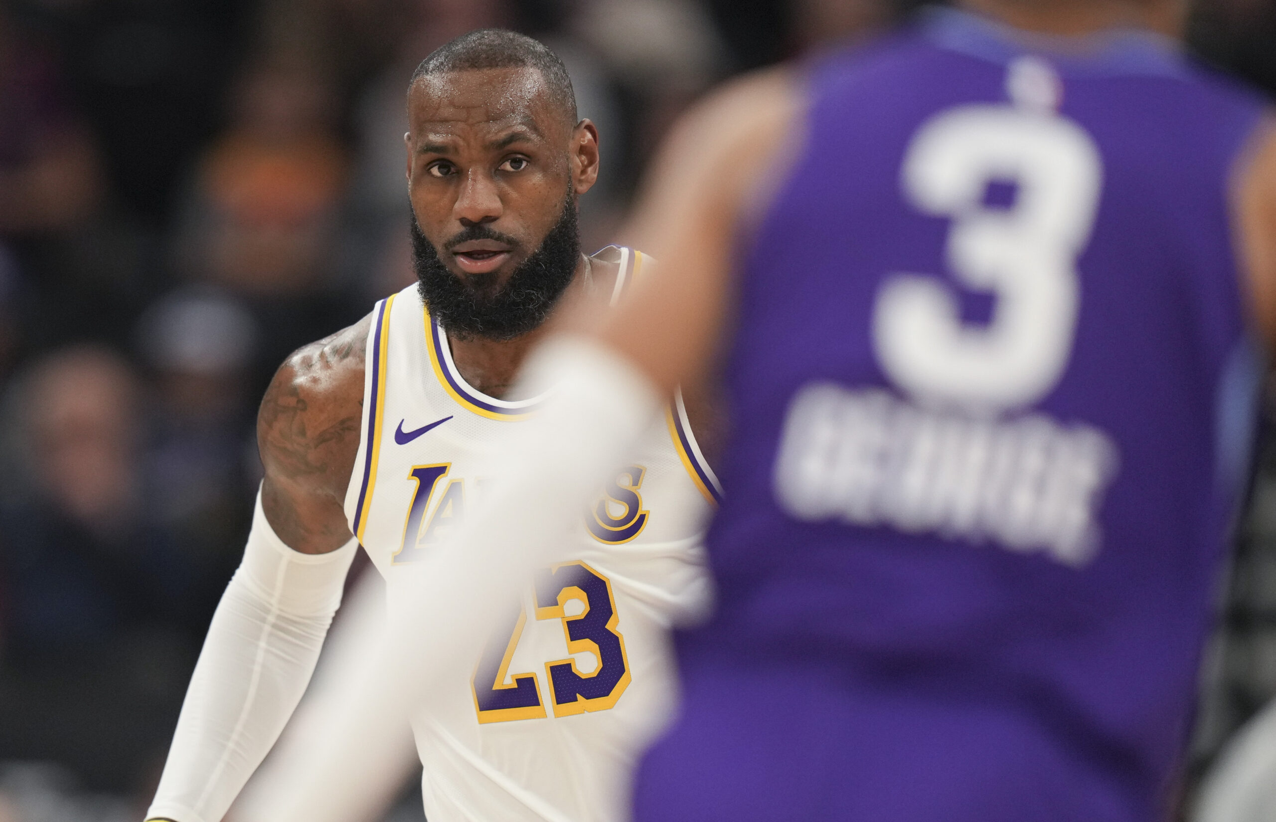 Lakers forward LeBron James (23) comes down the court as...