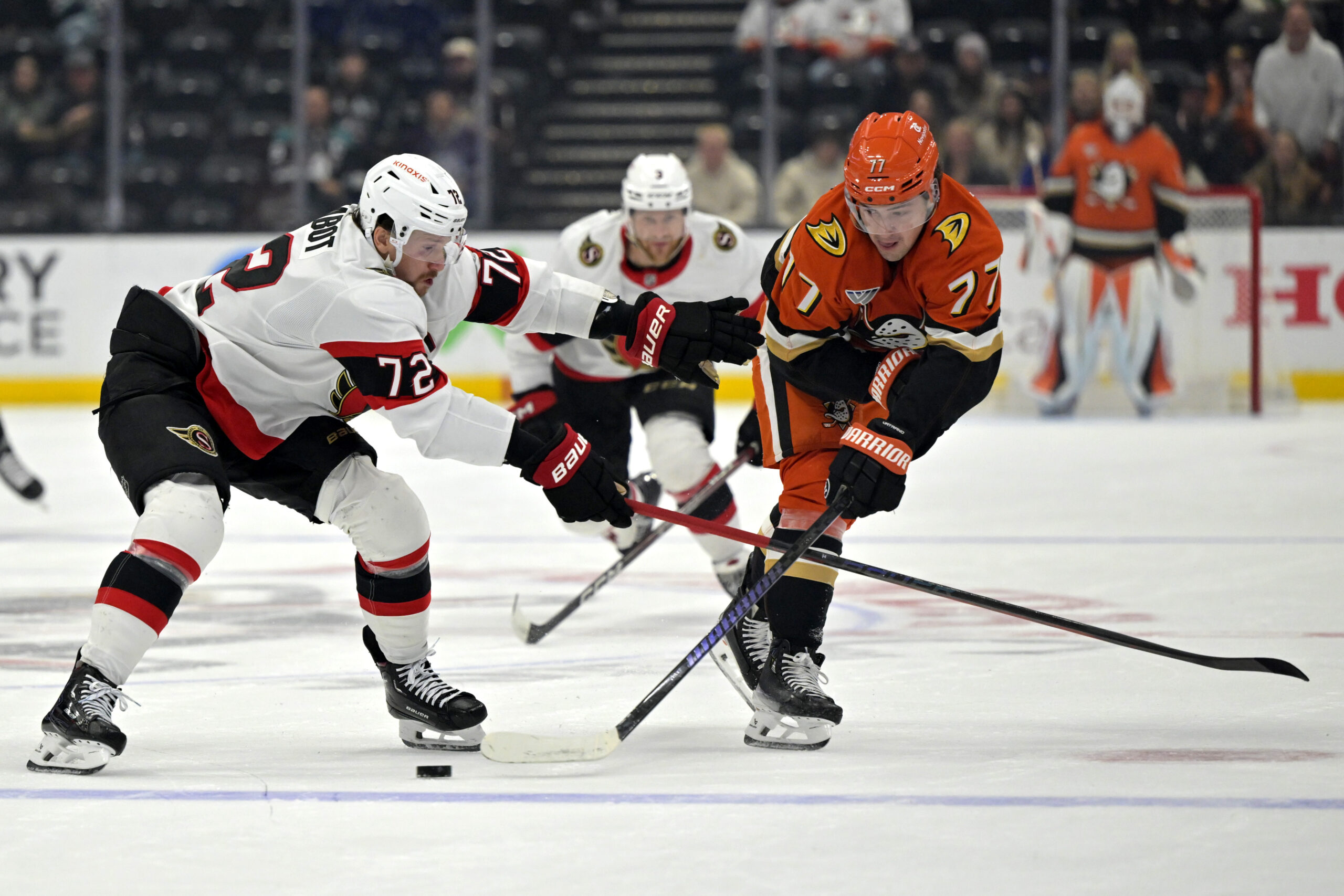 Ottawa Senators defenseman Thomas Chabot, left, and Ducks right wing...