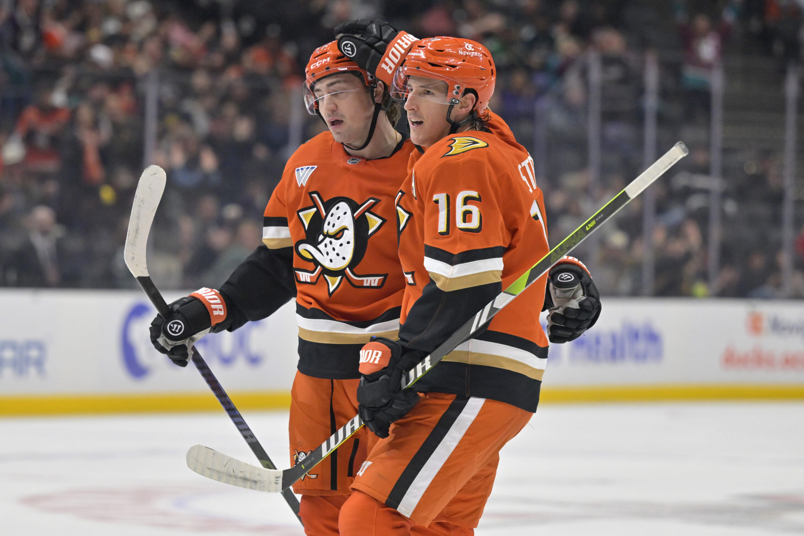 Ducks right wing Frank Vatrano, left, is congratulated by center...