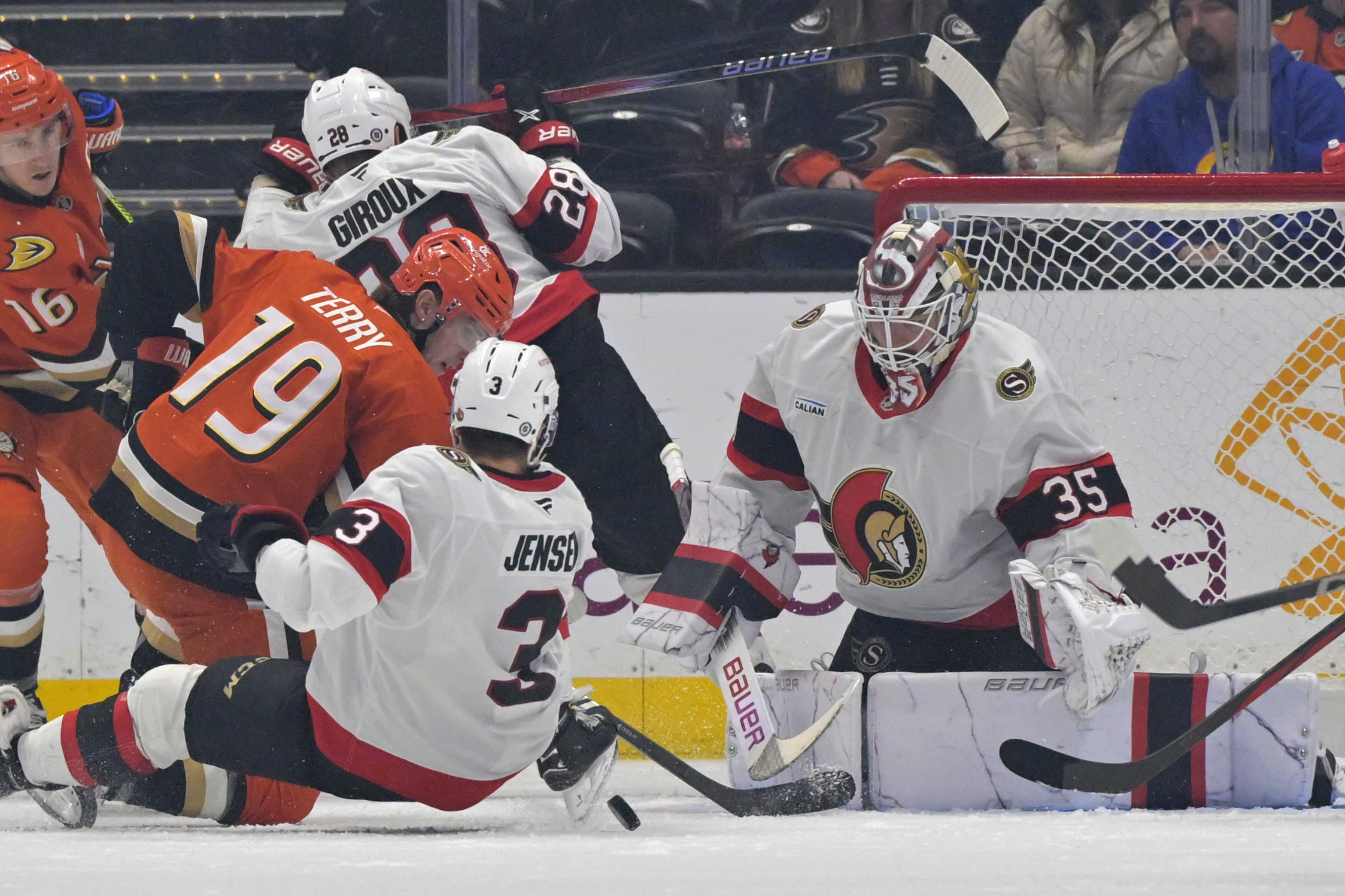 Ottawa Senators goaltender Linus Ullmark and defenseman Nick Jensen (3)...