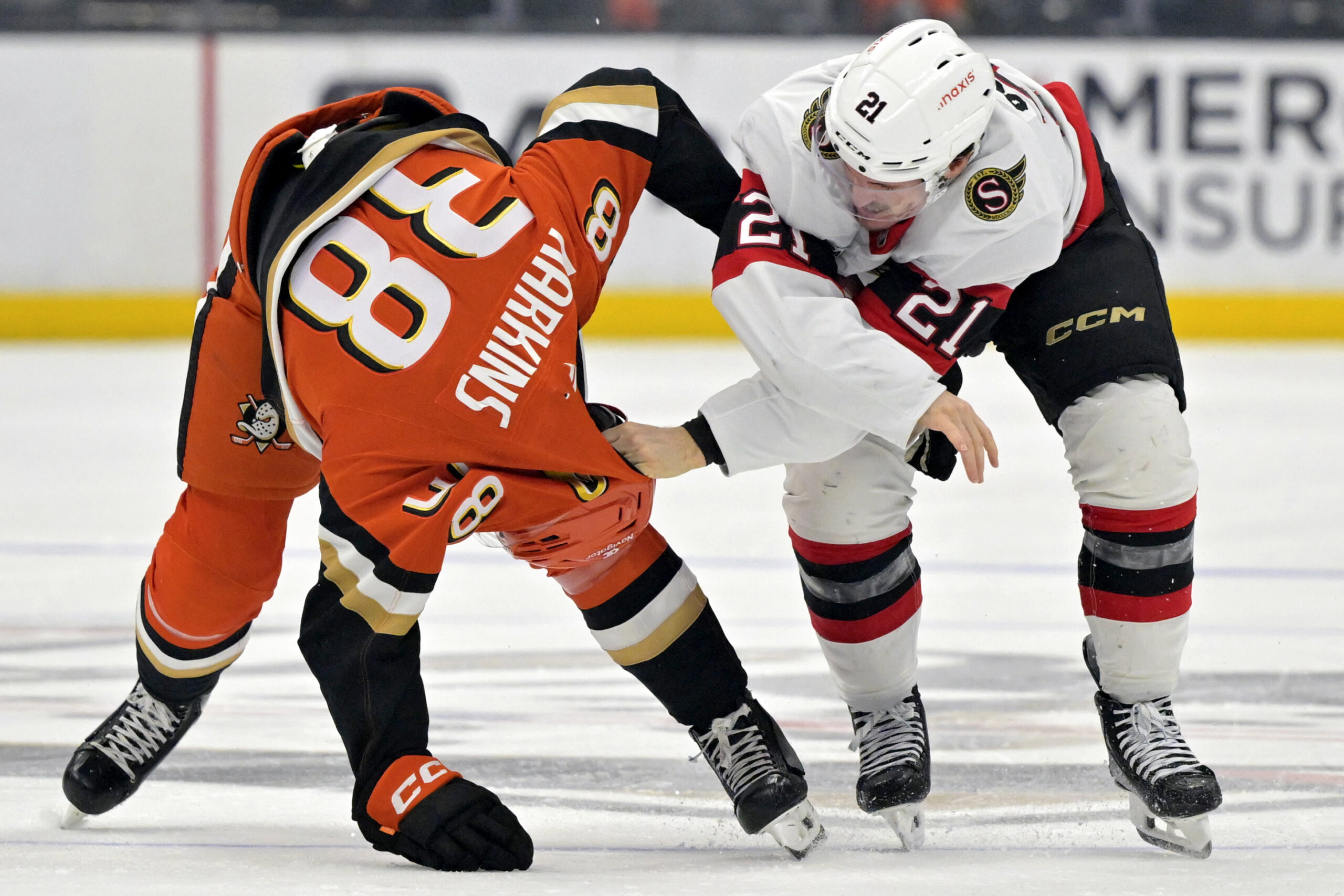 Ducks center Jansen Harkins (38) and Ottawa Senators center Nick...