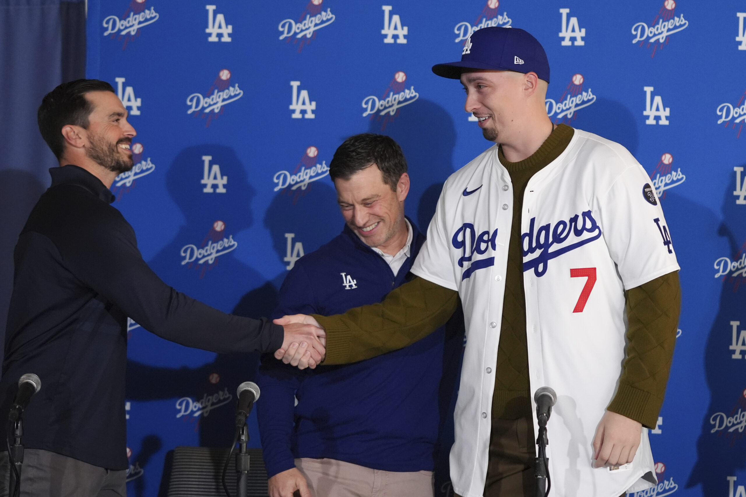 New Dodgers pitcher Blake Snell, right, shakes hands with Dodgers...