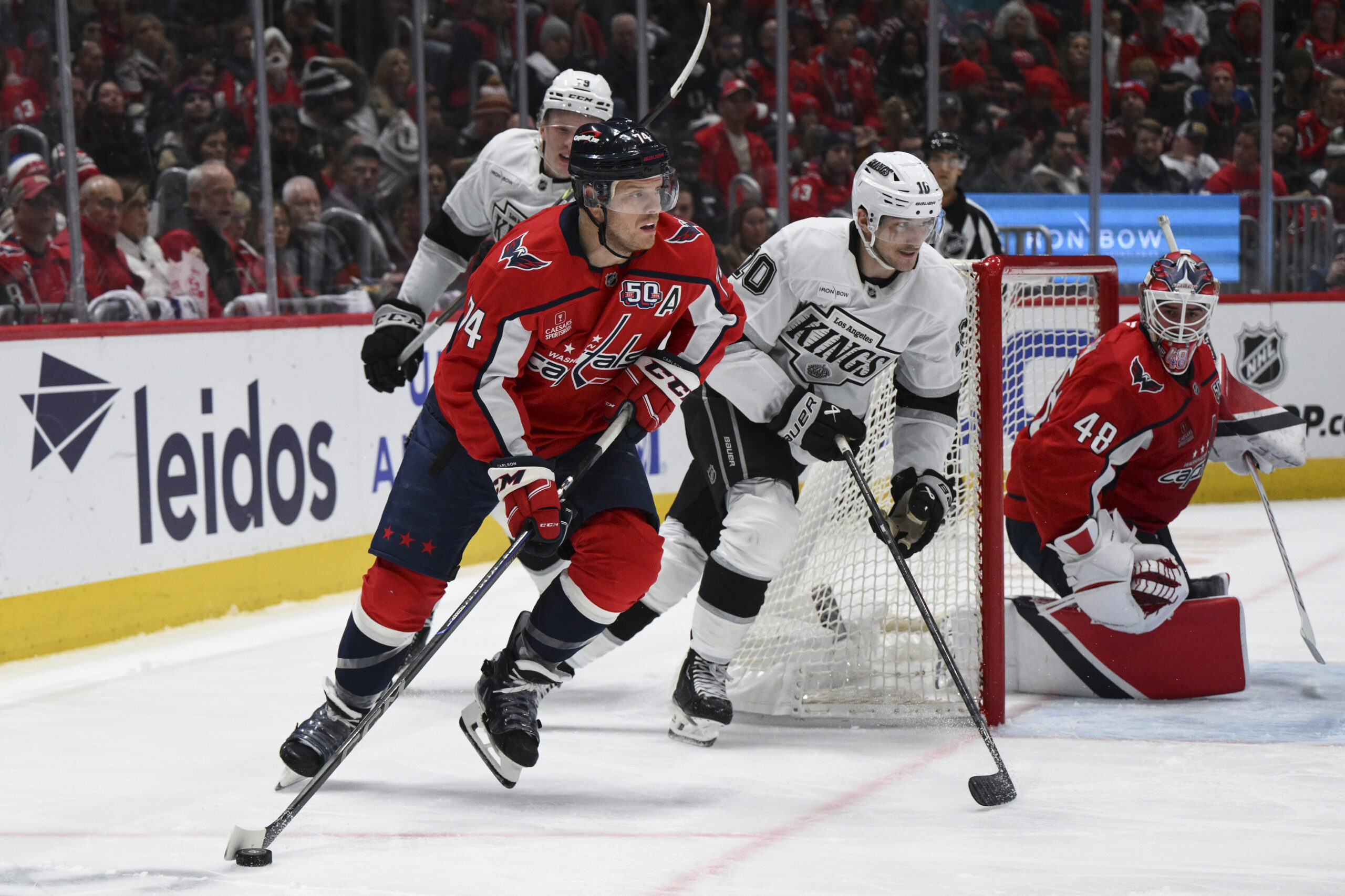 Washington Capitals defenseman John Carlson (74) handles the puck during...