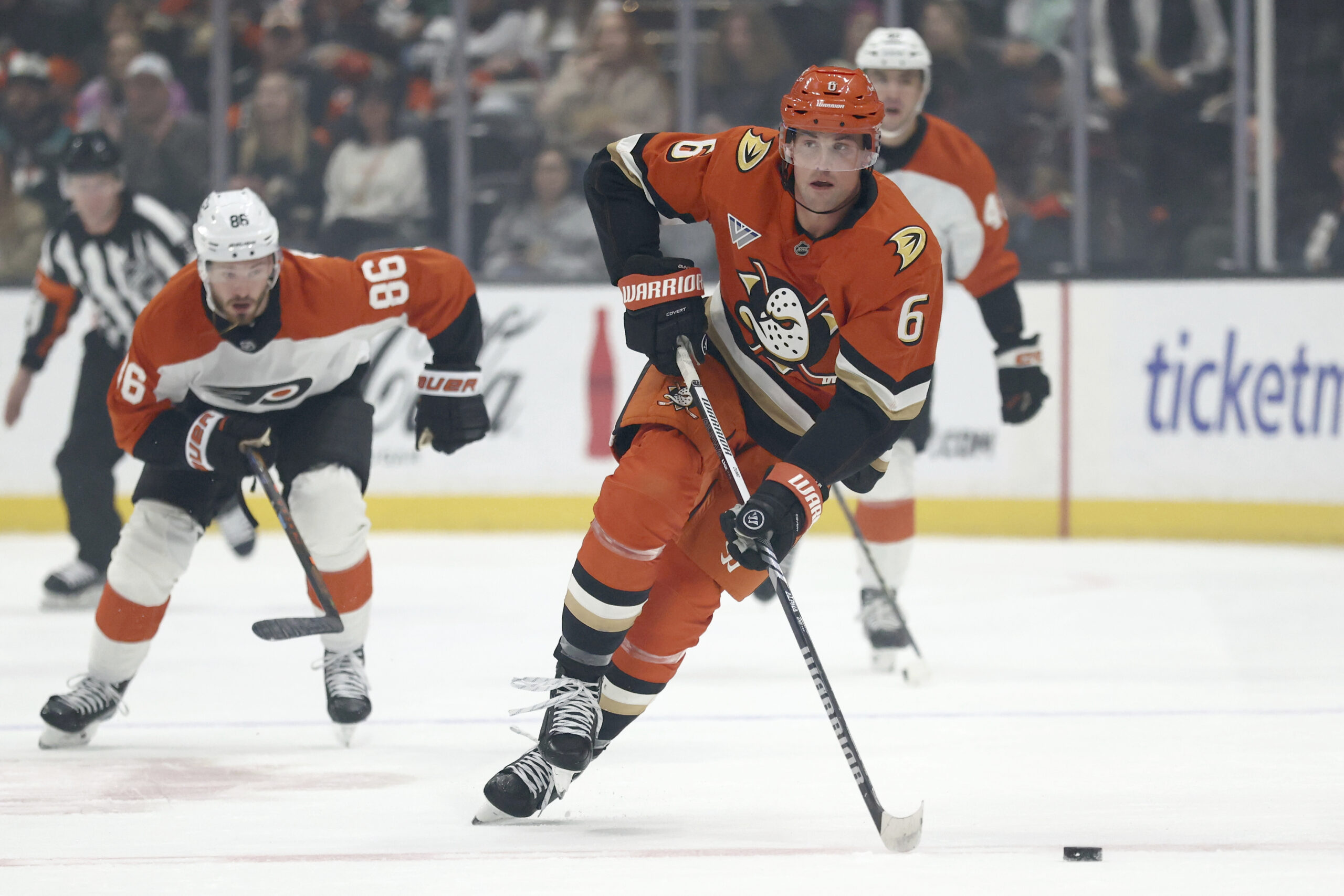 Ducks defenseman Brian Dumoulin (6) moves the puck against the...