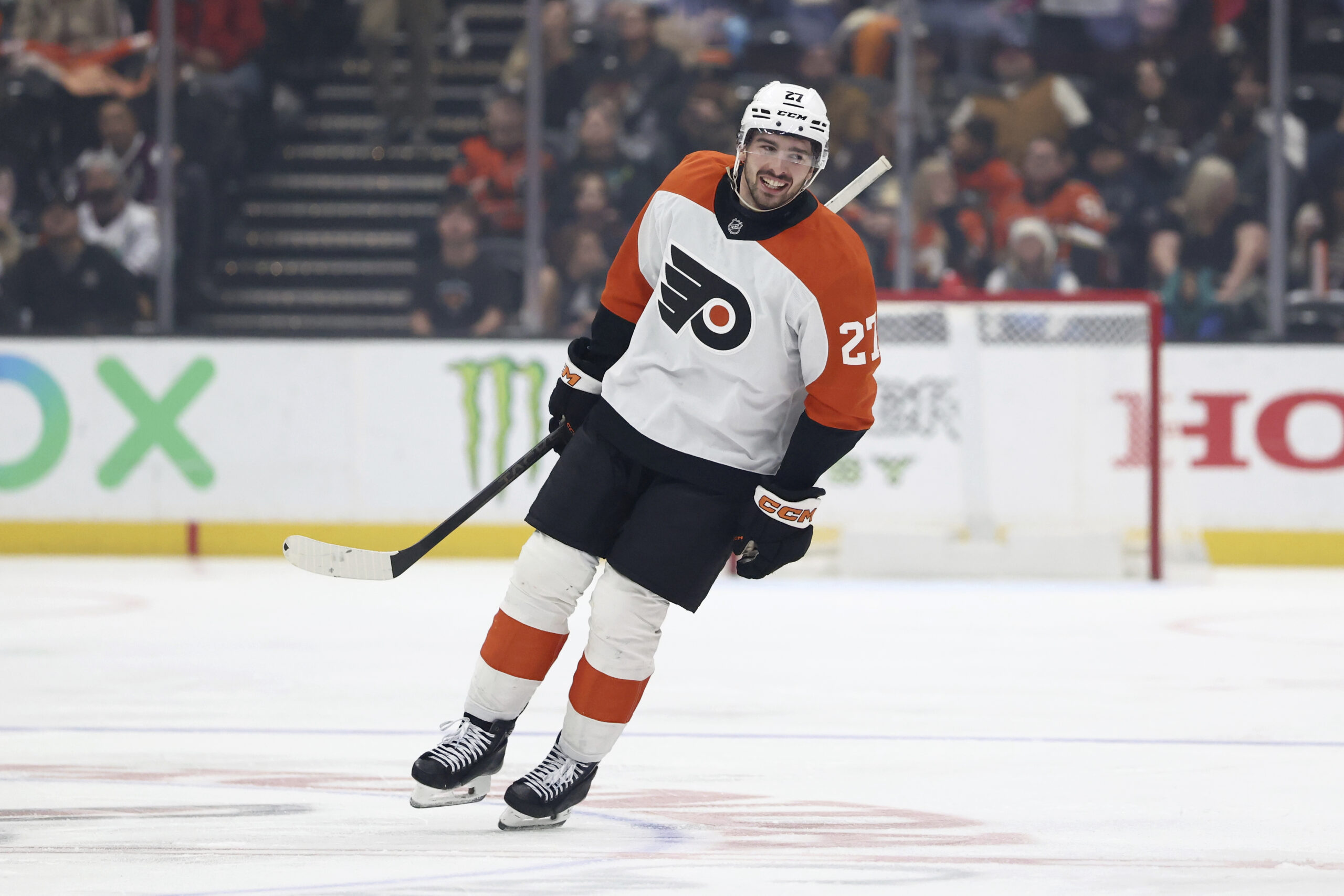 Philadelphia Flyers left wing Noah Cates (27) reacts after scoring...