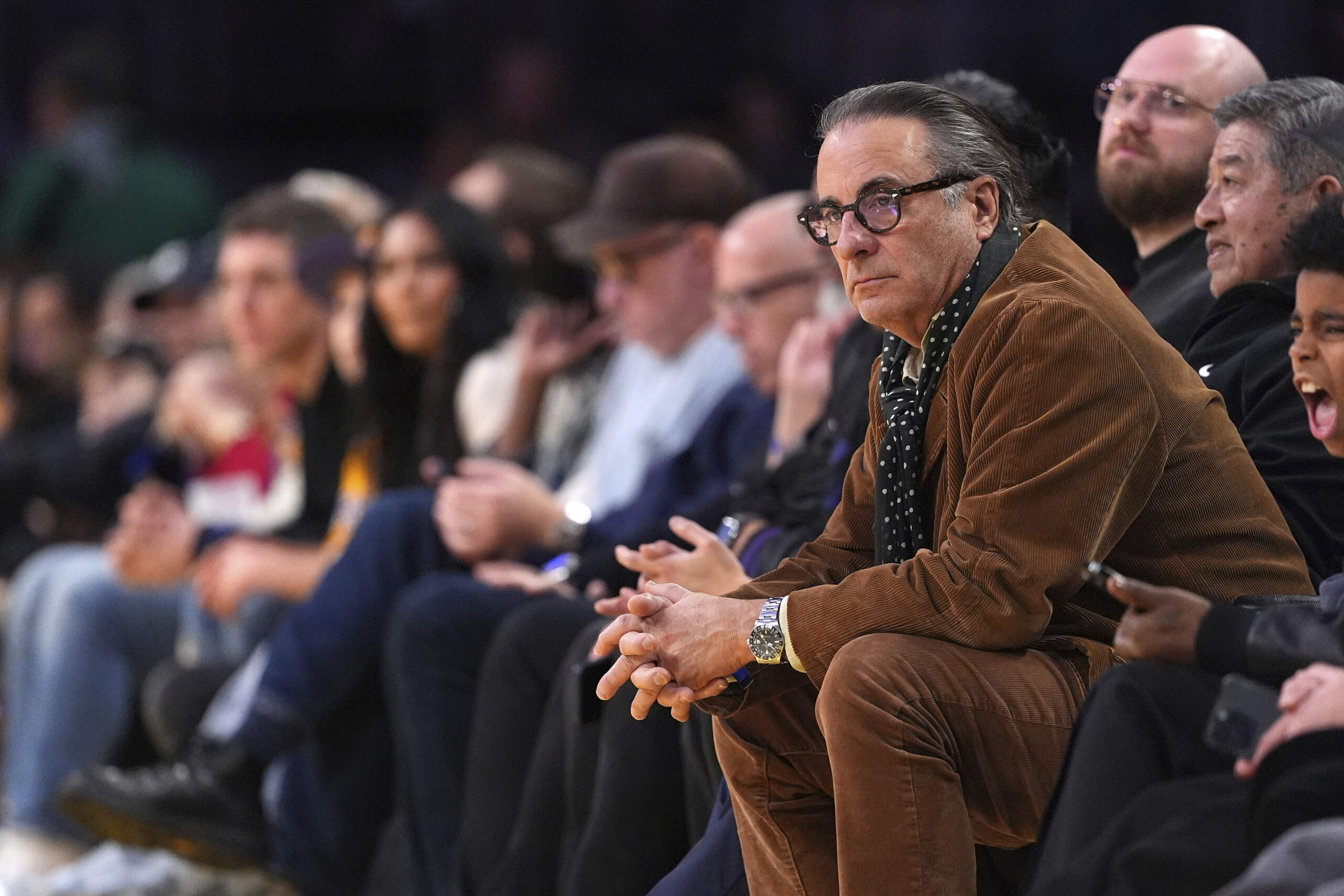 Actor Andy Garcia watches during the second half of an...