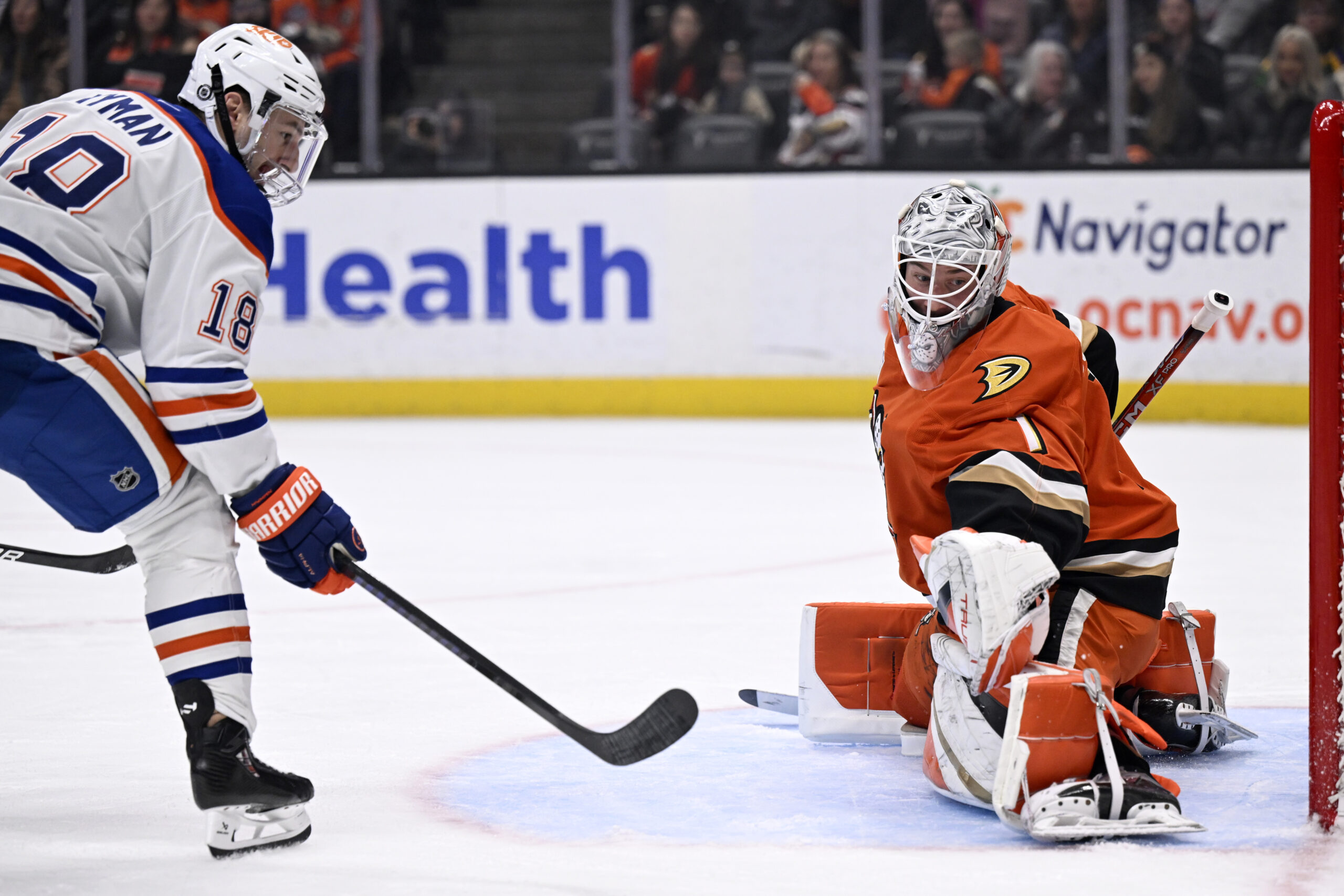 Ducks goaltender Lukas Dostal (1) makes a save against Edmonton...