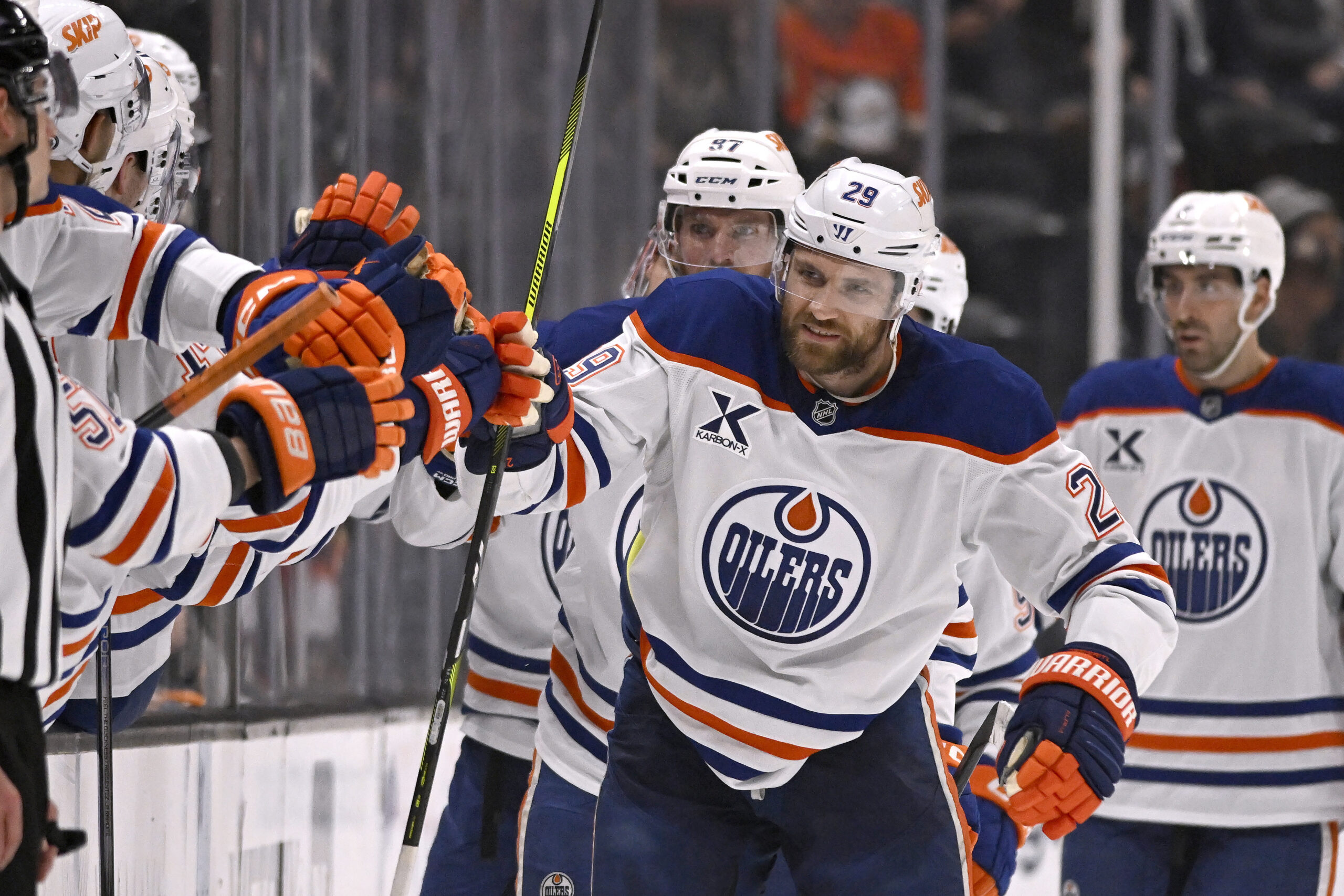 Edmonton Oilers center Leon Draisaitl (29) celebrates with teammates after...