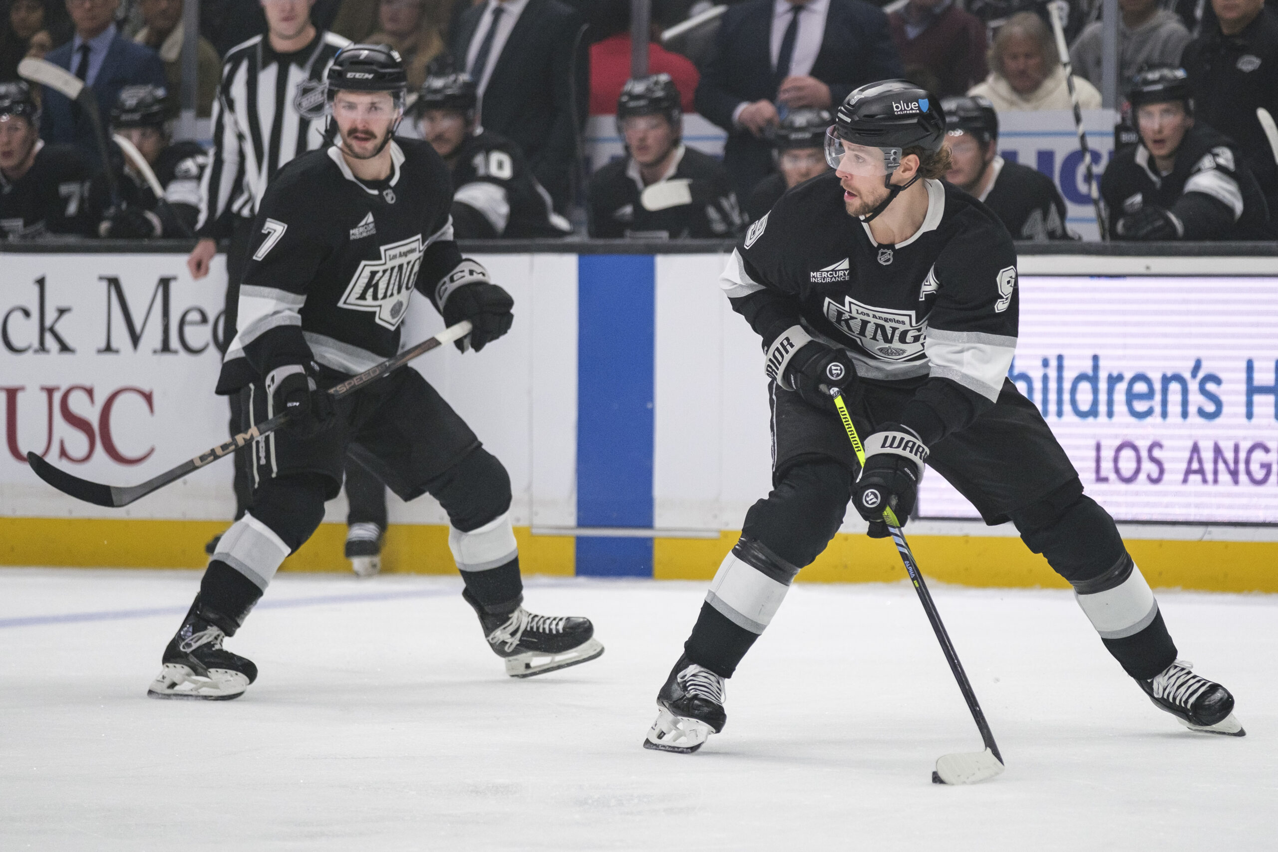 Kings right wing Adrian Kempe (9) controls the puck during...