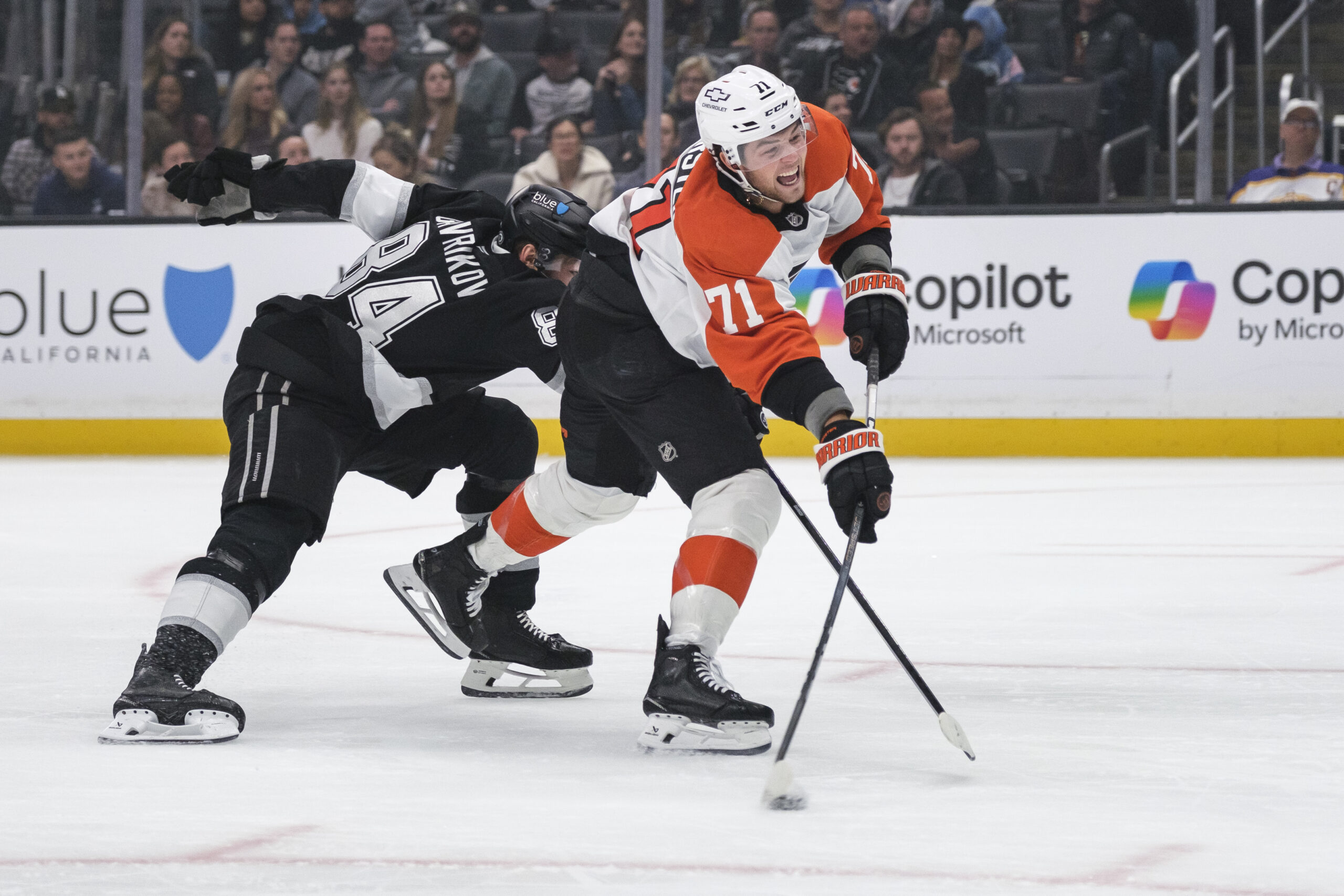 Philadelphia Flyers right wing Tyson Foerster (71) scores while under...