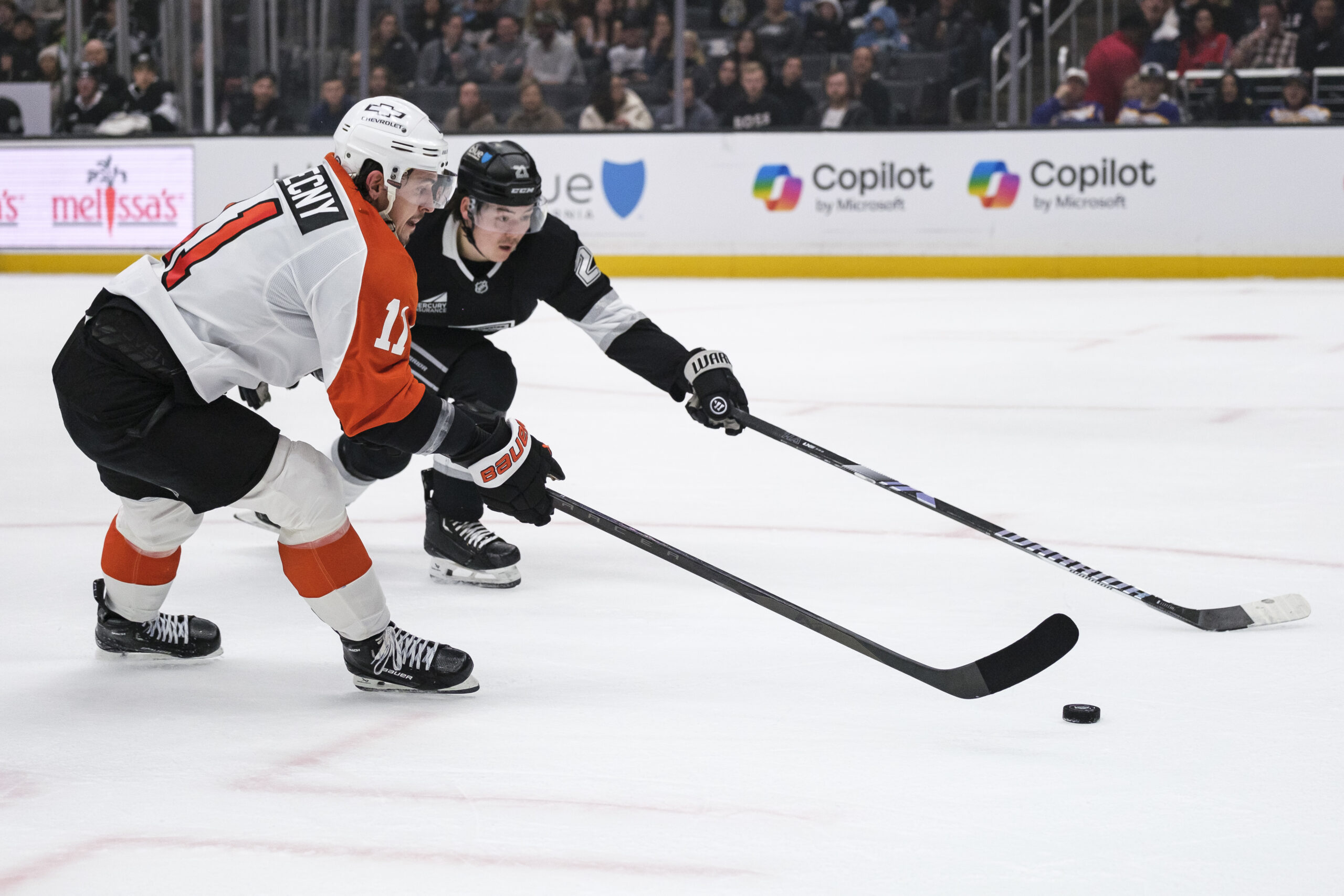 Philadelphia Flyers right wing Travis Konecny (11) and Kings defenseman...