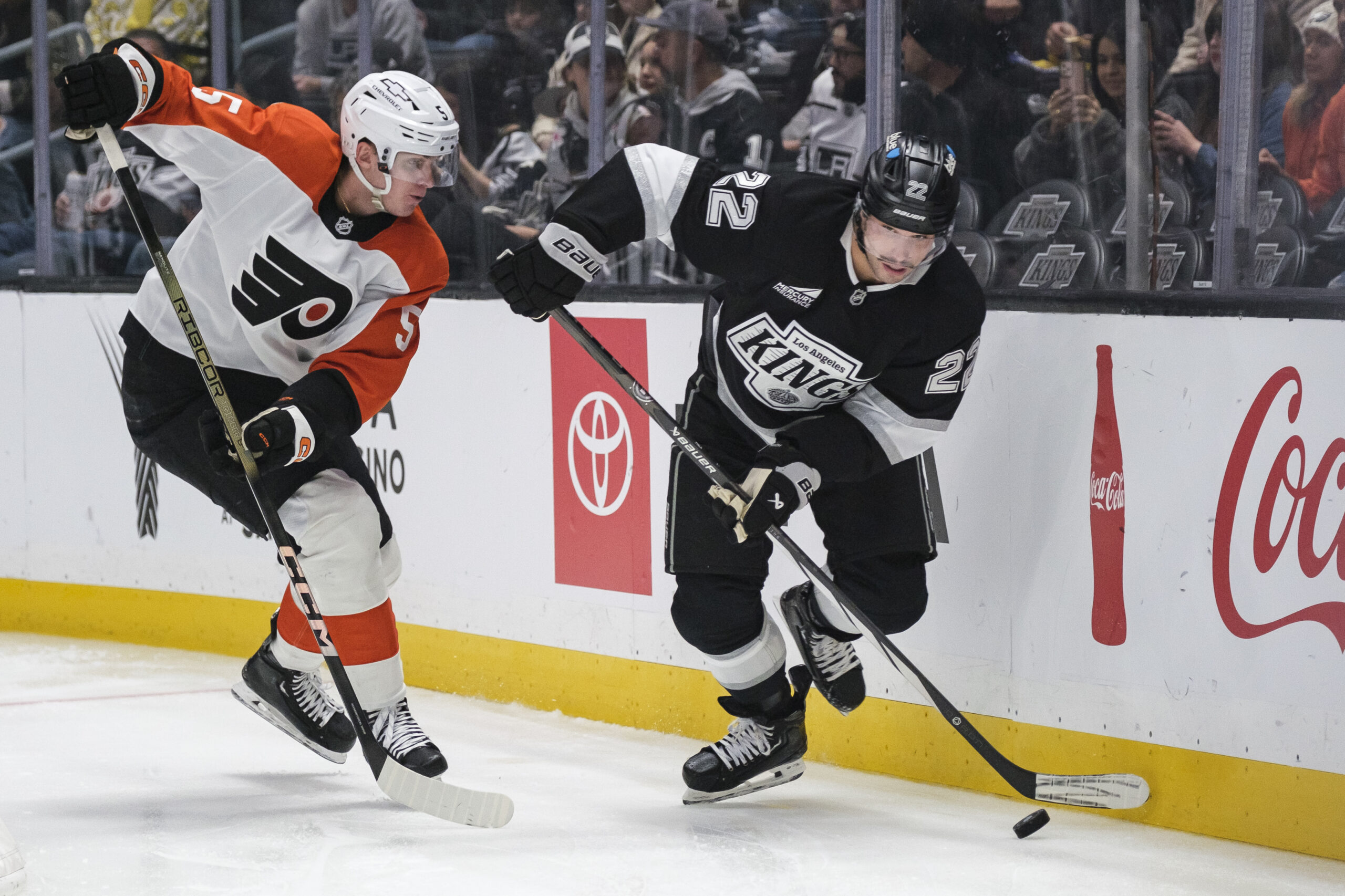 Kings left wing Kevin Fiala (22) looks to pass the...