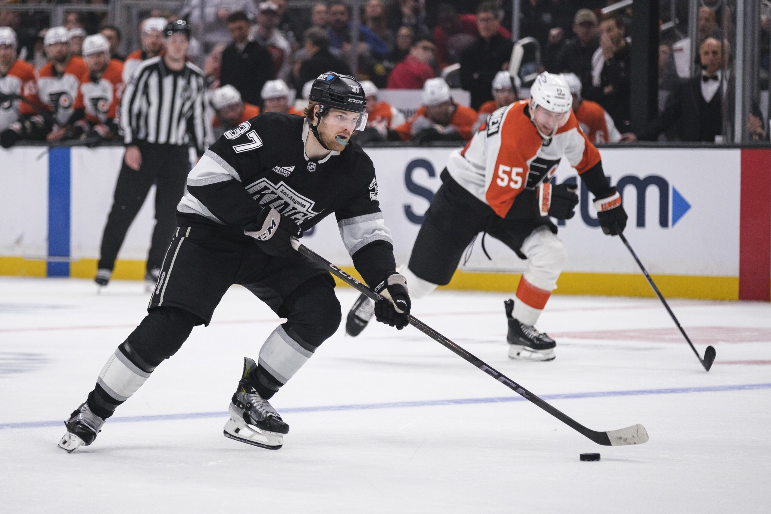 Kings left wing Warren Foegele (37) looks to shoot the...