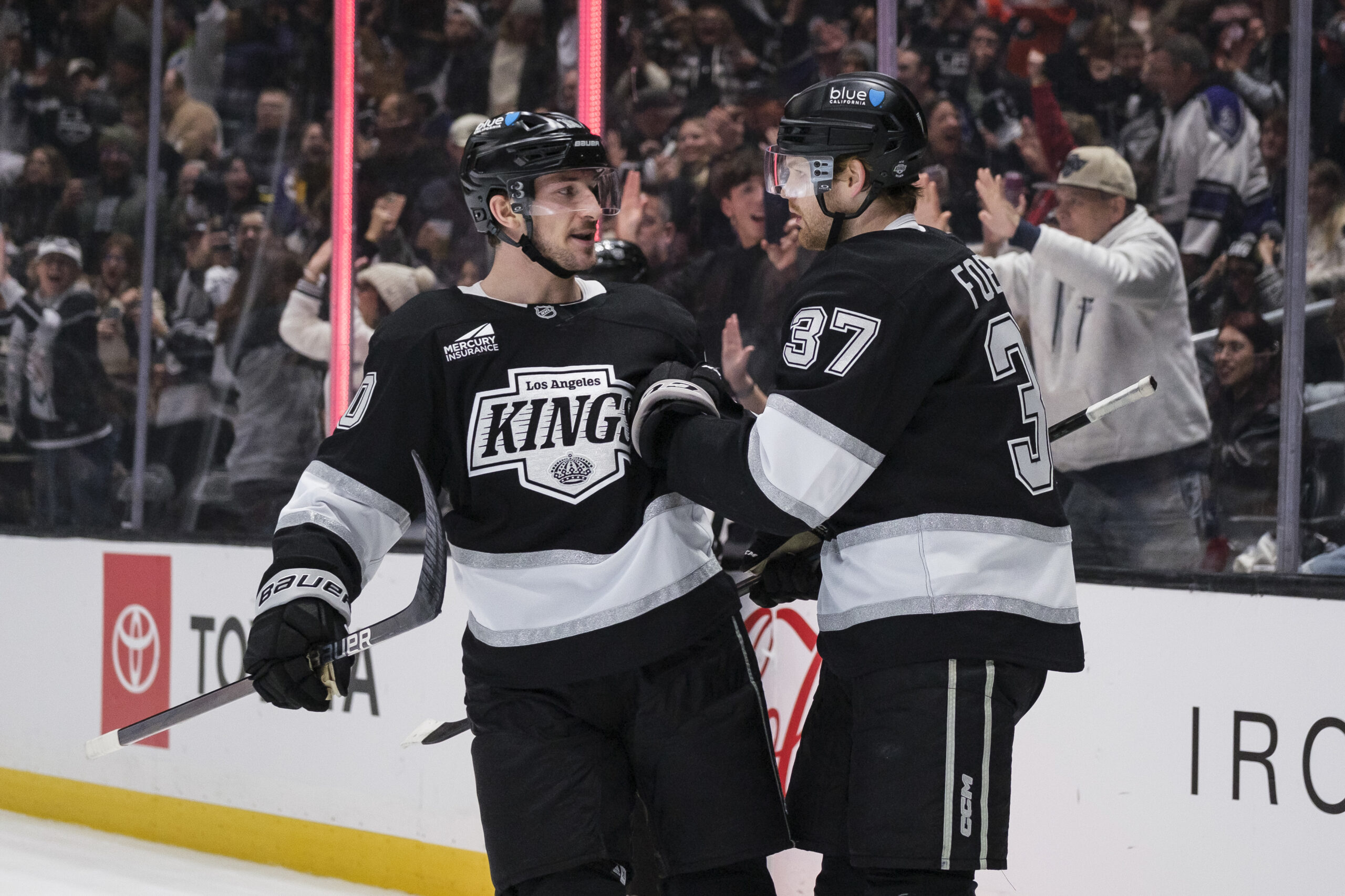 Kings left wing Warren Foegele (37) celebrates with left wing...