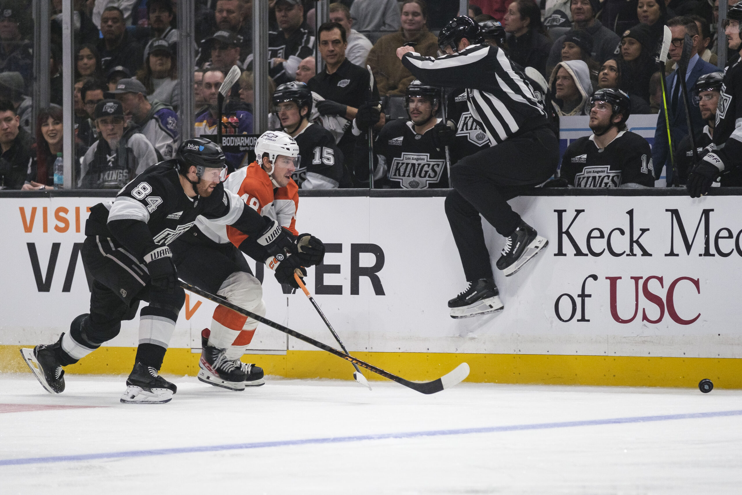 Kings defenseman Vladislav Gavrikov (84) and Philadelphia Flyers center Morgan...