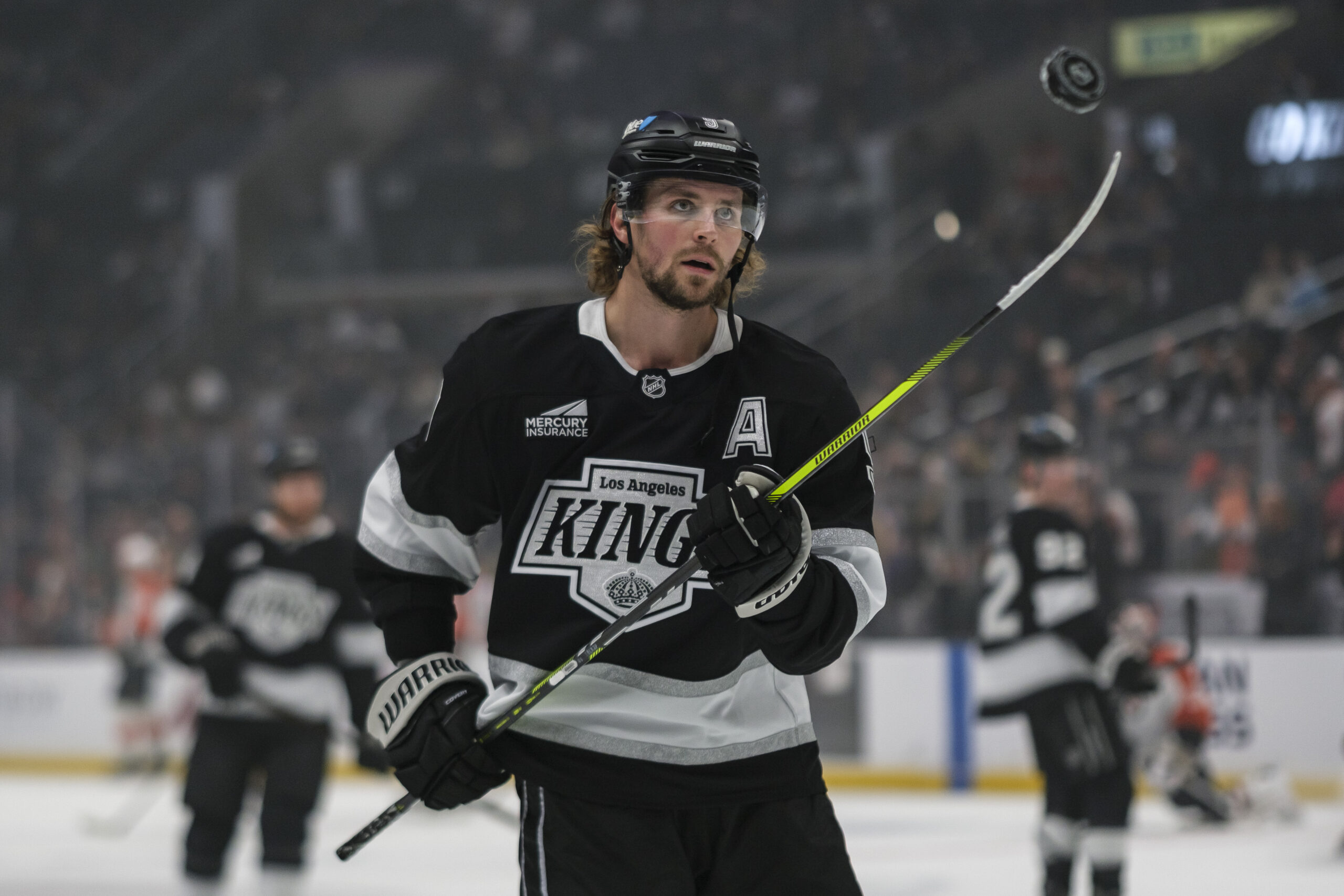 Kings right wing Adrian Kempe (9) juggles a puck during...