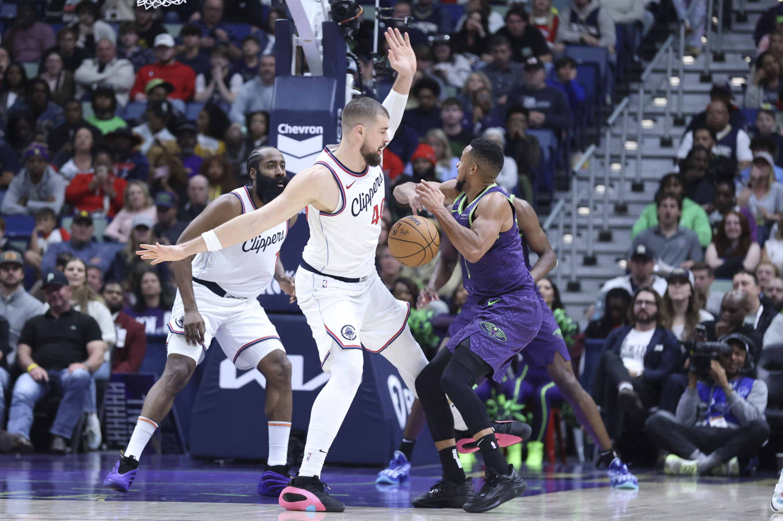 New Orleans Pelicans guard CJ McCollum loses control of the...