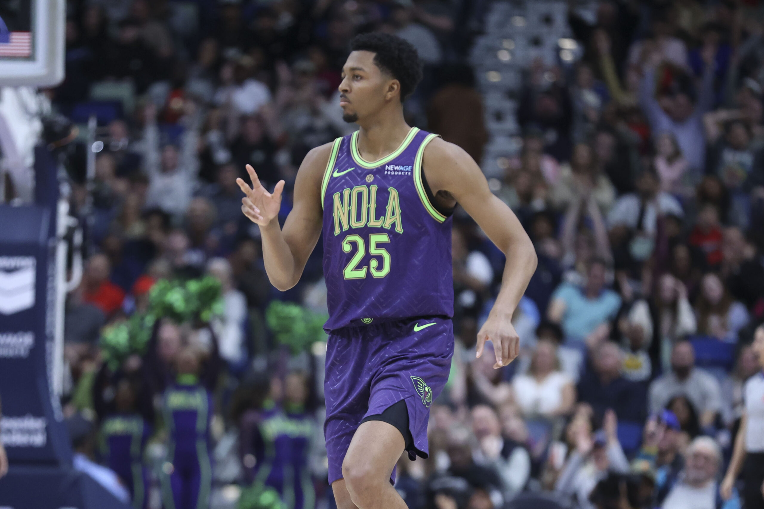 New Orleans Pelicans guard Trey Murphy III celebrates after making...