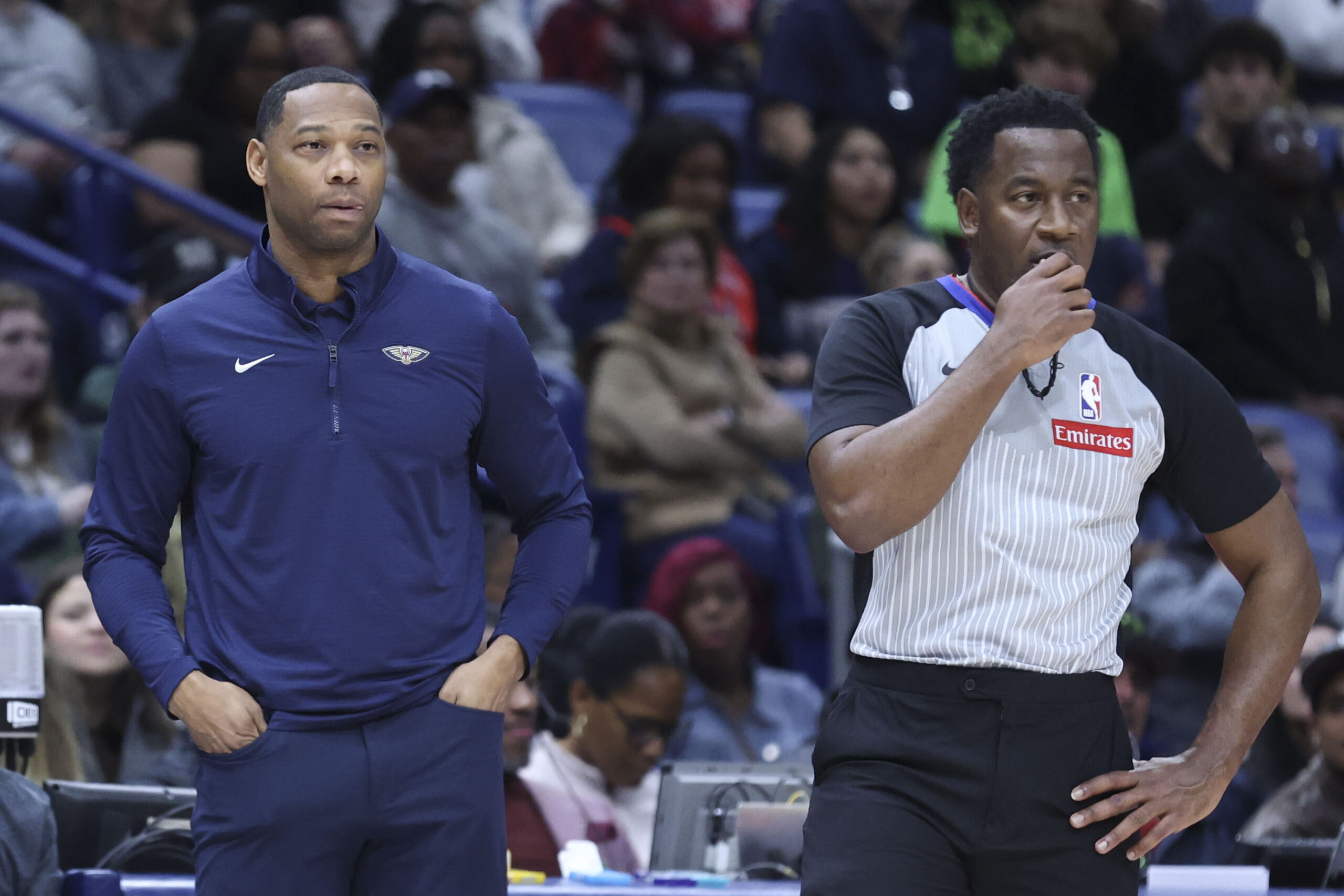 New Orleans Pelicans head coach Willie Green talks to a...