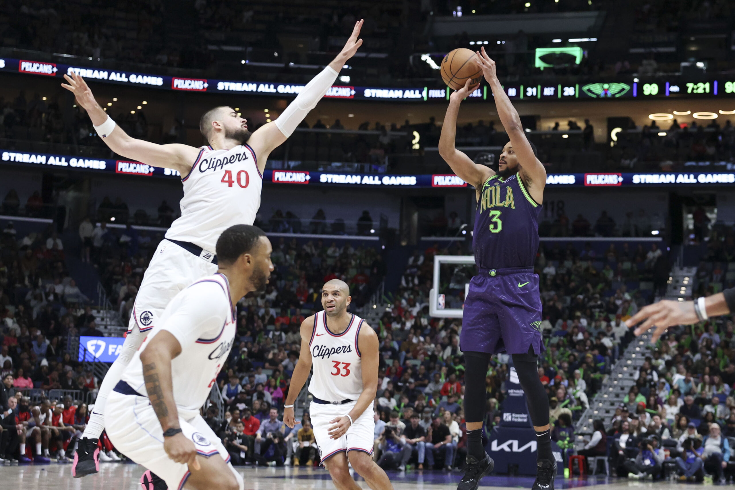 New Orleans Pelicans guard CJ McCollum (3) shoots a jumper...