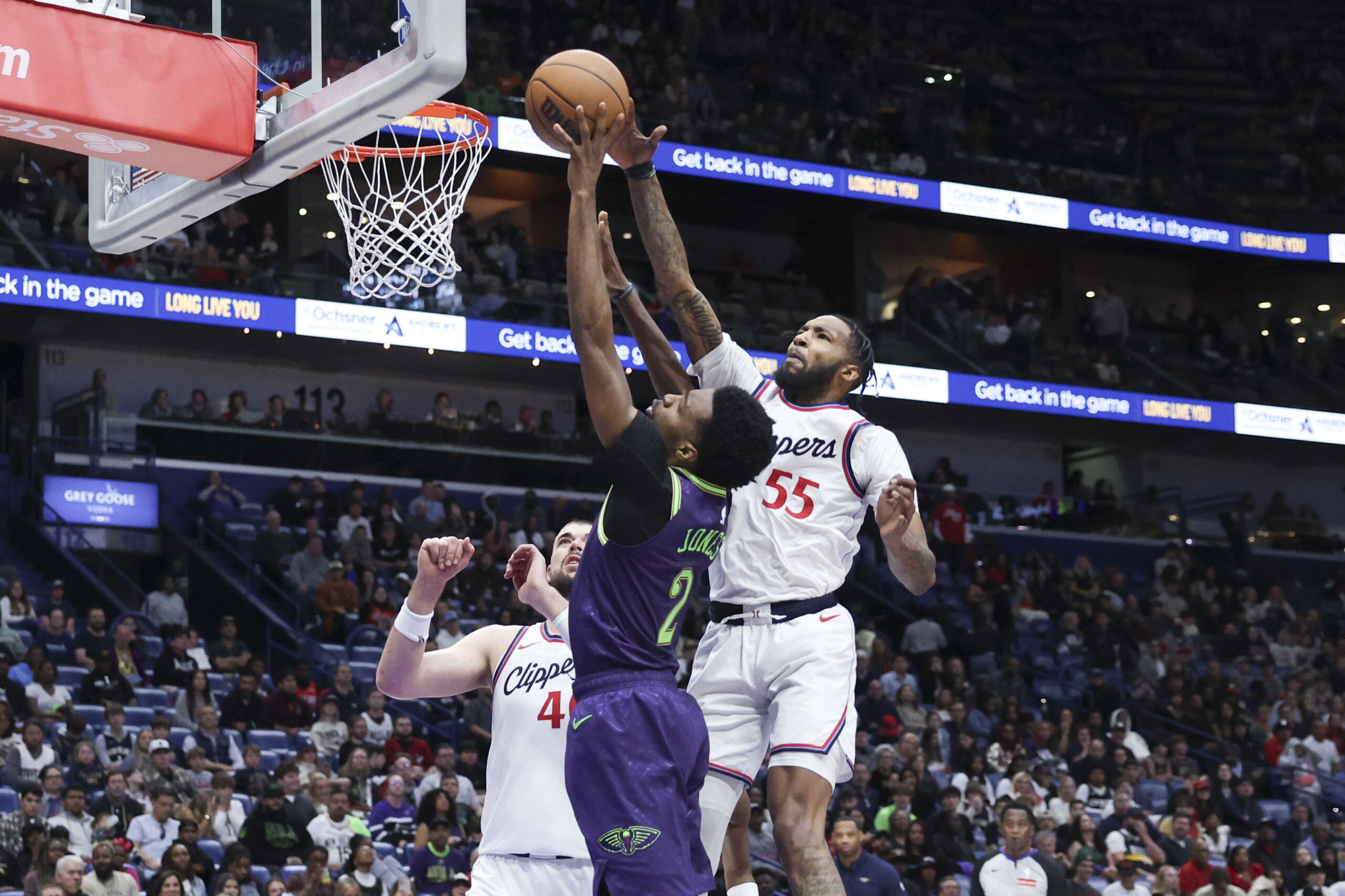 Clippers forward Derrick Jones Jr. (55) blocks New Orleans Pelicans...