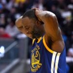 Dec 25, 2024; San Francisco, California, USA; Golden State Warriors forward Draymond Green (23) reacts after a turnover against the Los Angeles Lakers during the fourth quarter at Chase Center. Mandatory Credit: Darren Yamashita-Imagn Images