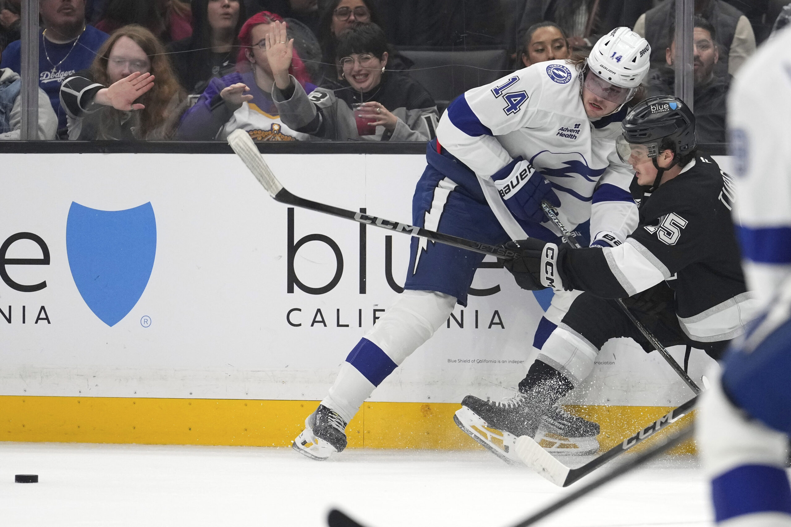 Tampa Bay Lightning center Conor Geekie, left, and Kings center...