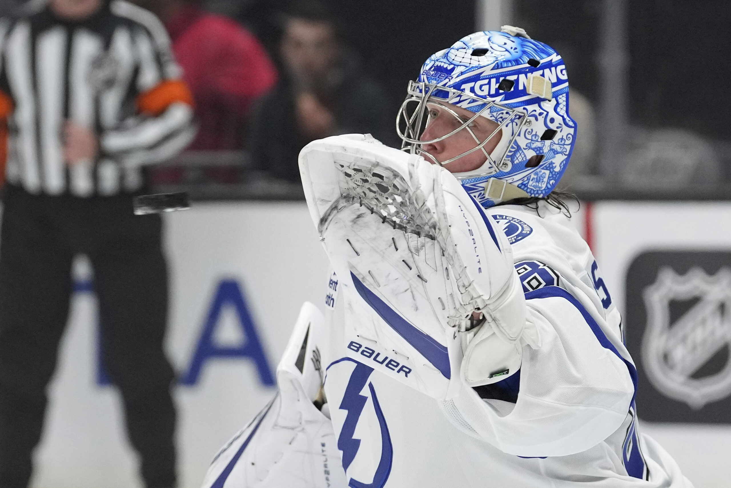 Tampa Bay Lightning goaltender Andrei Vasilevskiy makes a glove safe...