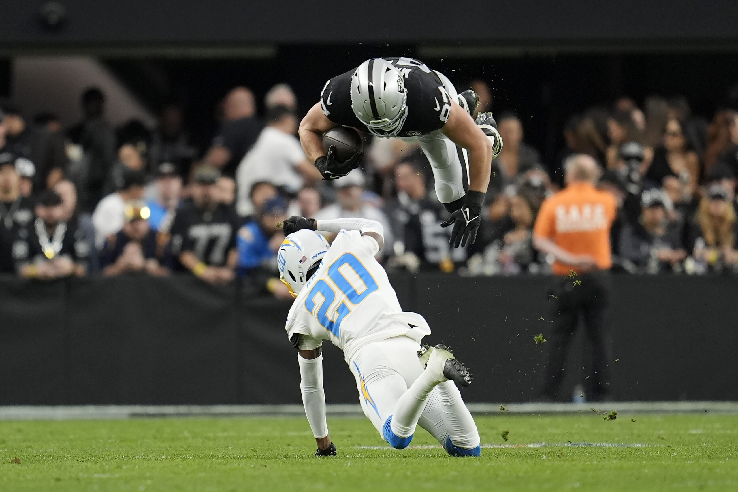 Las Vegas Raiders tight end Michael Mayer (87) is tackled...