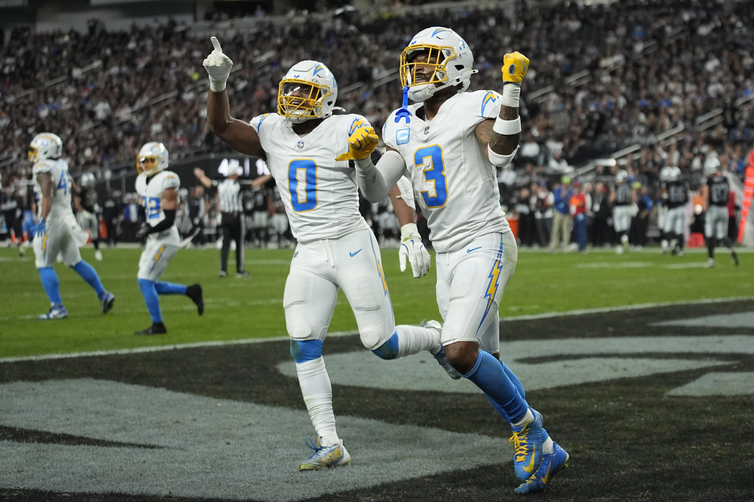 Los Angeles Chargers safety Derwin James Jr. (3) celebrates with...