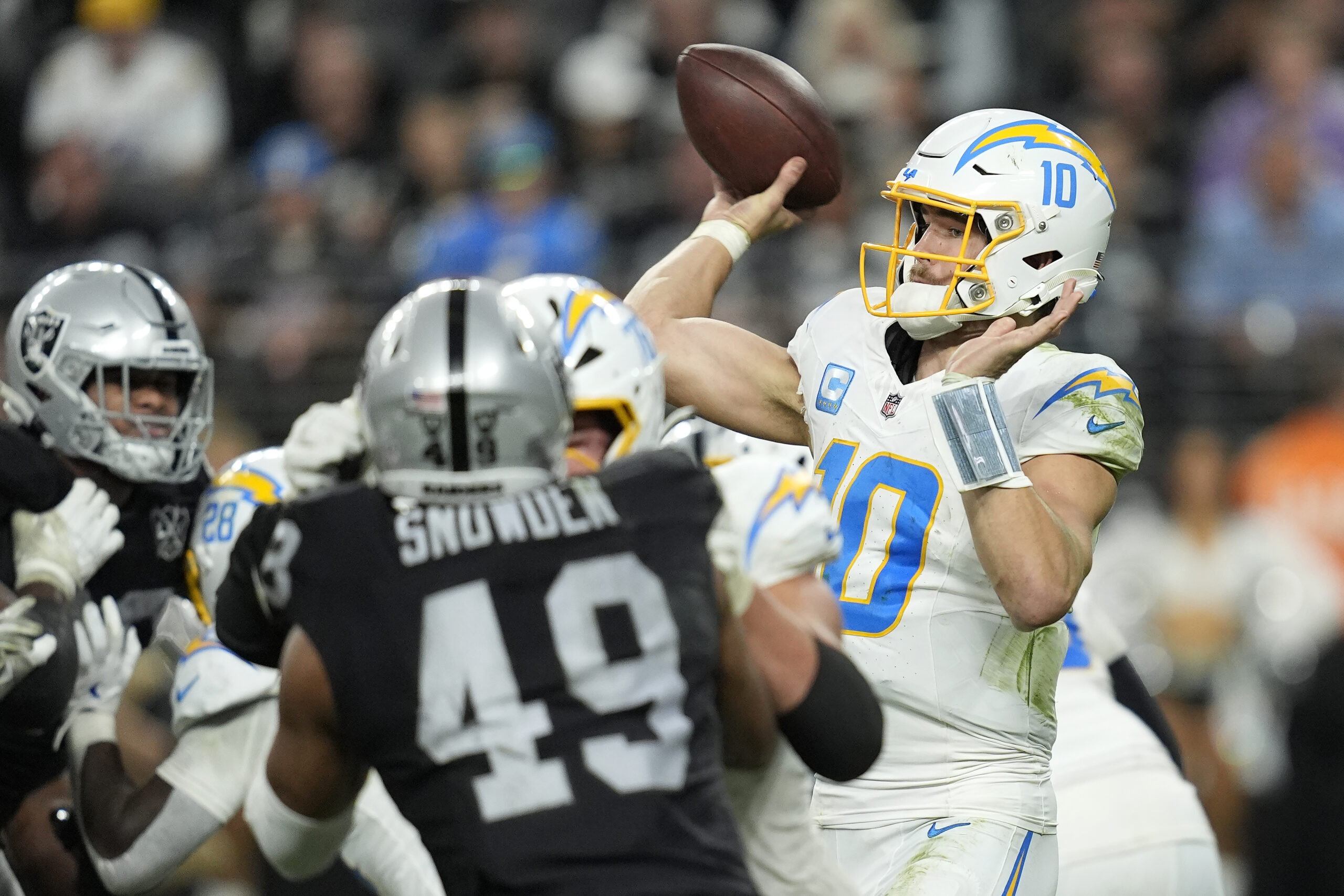 Los Angeles Chargers quarterback Justin Herbert (10) passes against the...