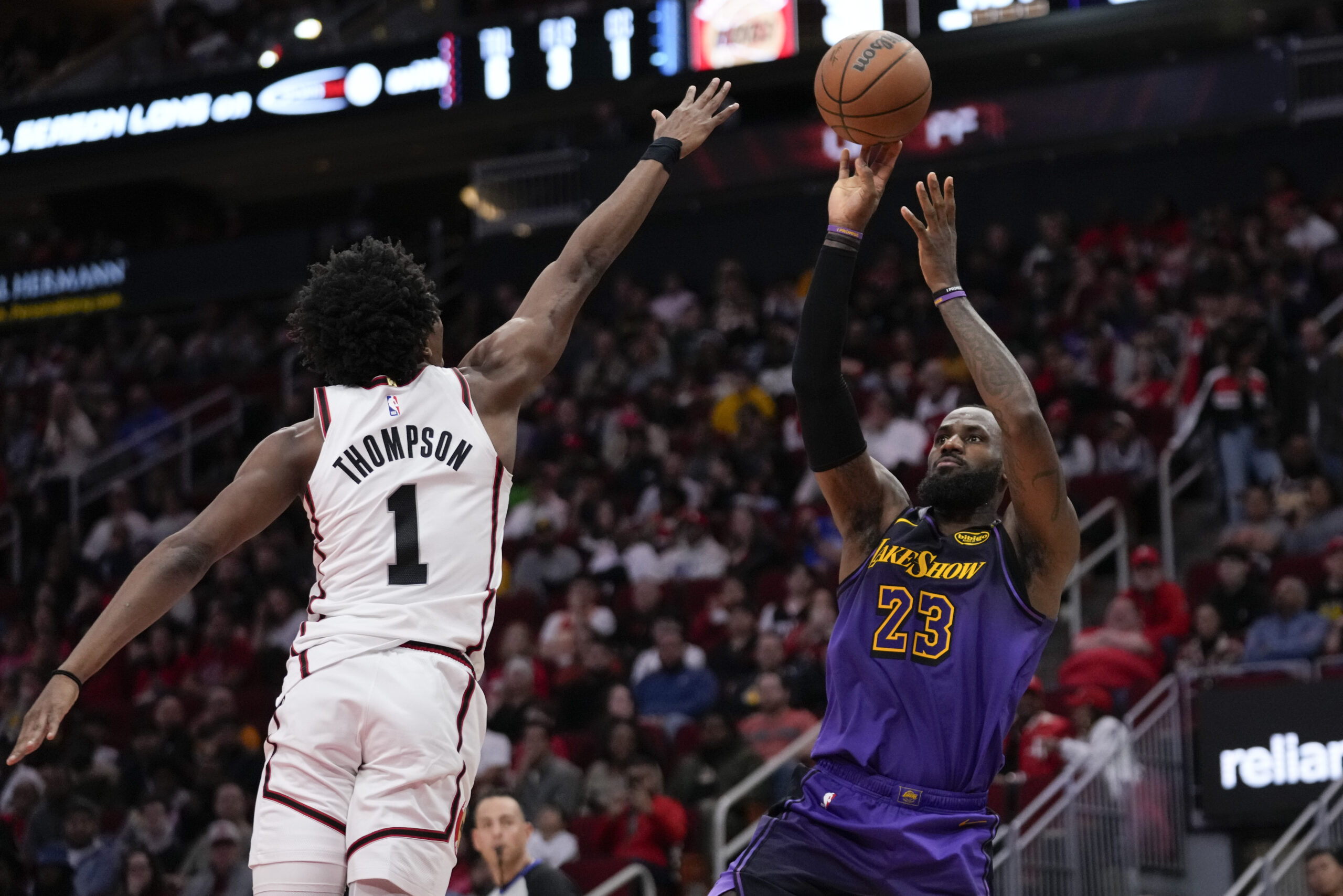 Lakers forward LeBron James (23) shoots against Houston Rockets forward...