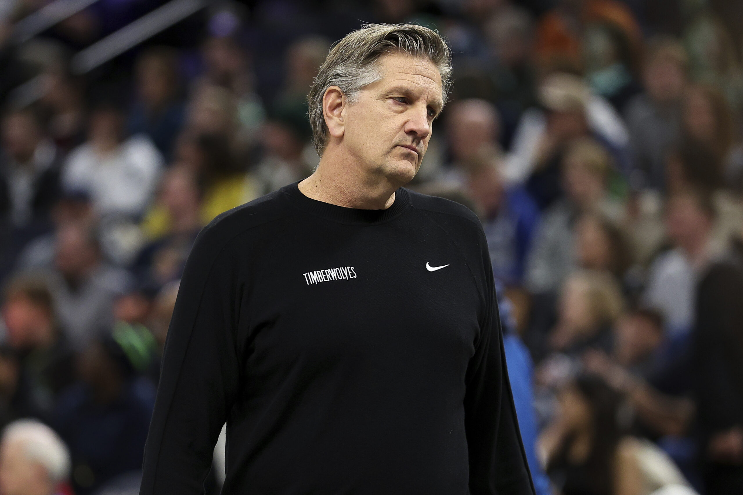 Minnesota Timberwolves head coach Chris Finch looks on from the...