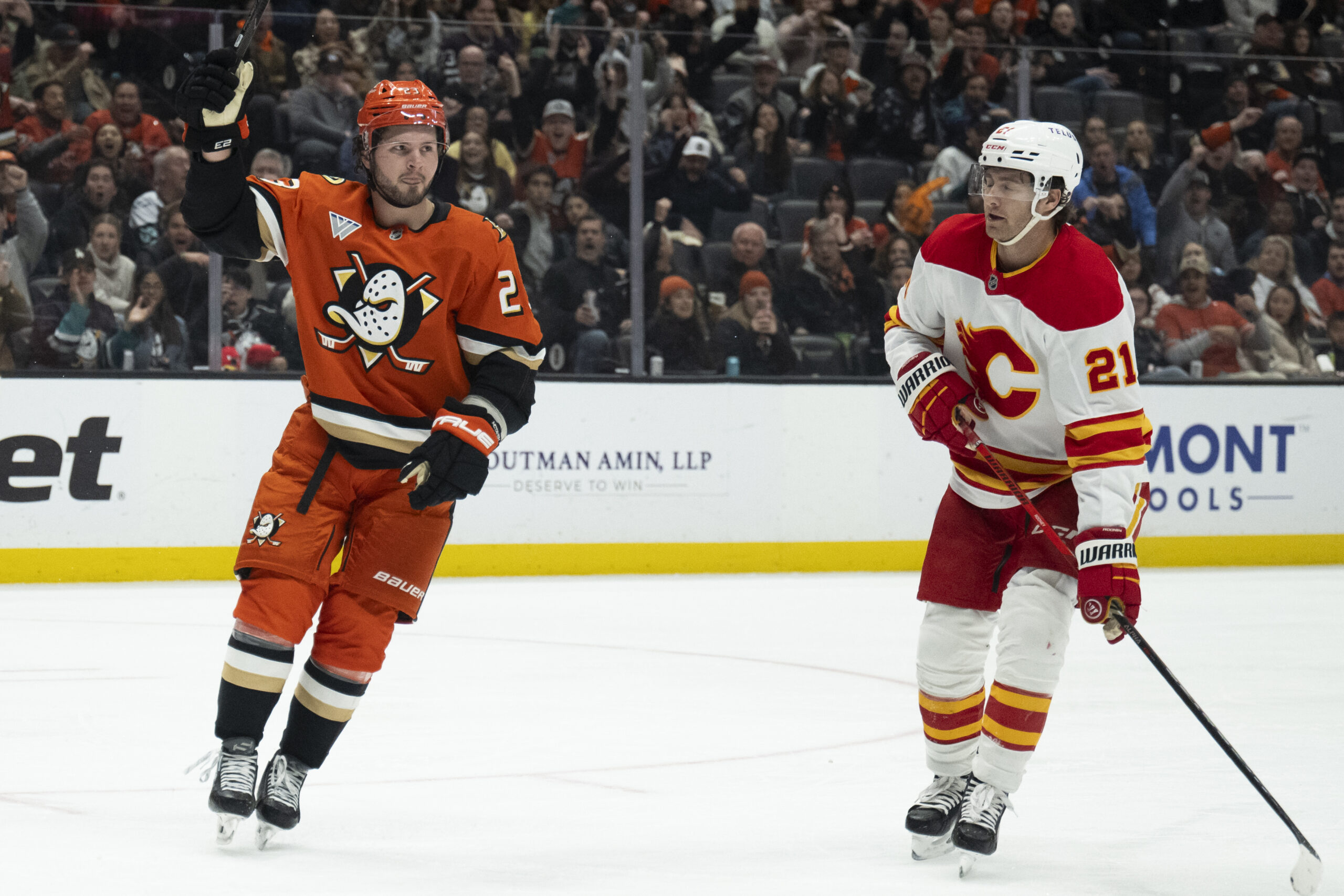 Ducks center Mason McTavish, left, celebrates his game-tying goal during...