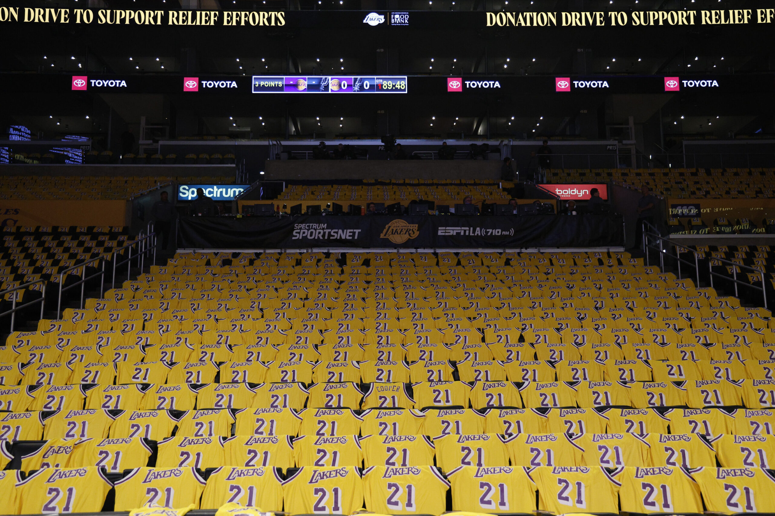 Jerseys with the number of former Lakers player Michel Cooper...