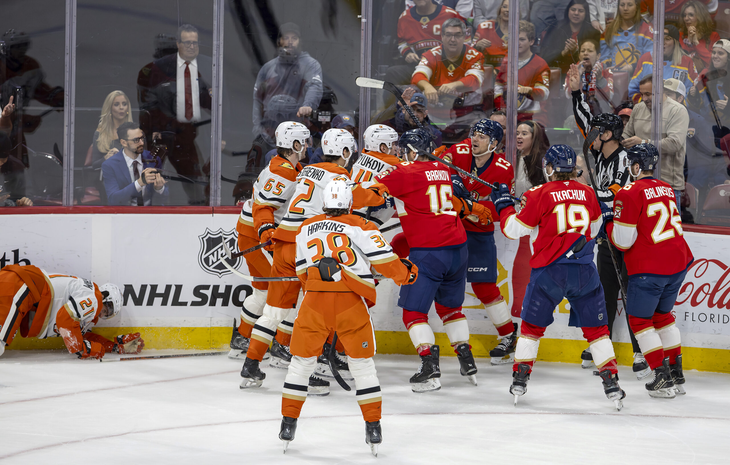 Players scuffle after Florida Panthers center Sam Reinhart (13) hit...