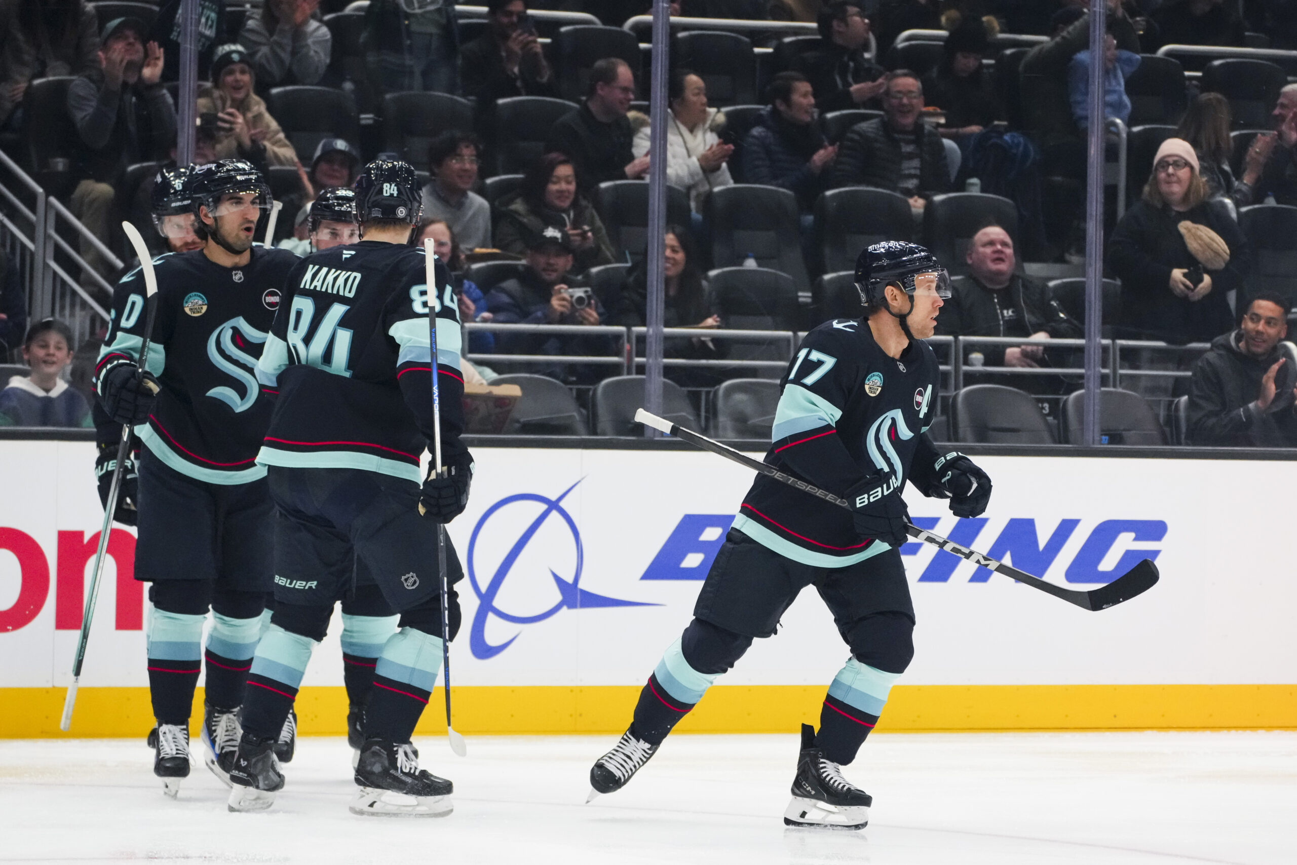 Seattle Kraken center Jaden Schwartz (17) skates back to the...